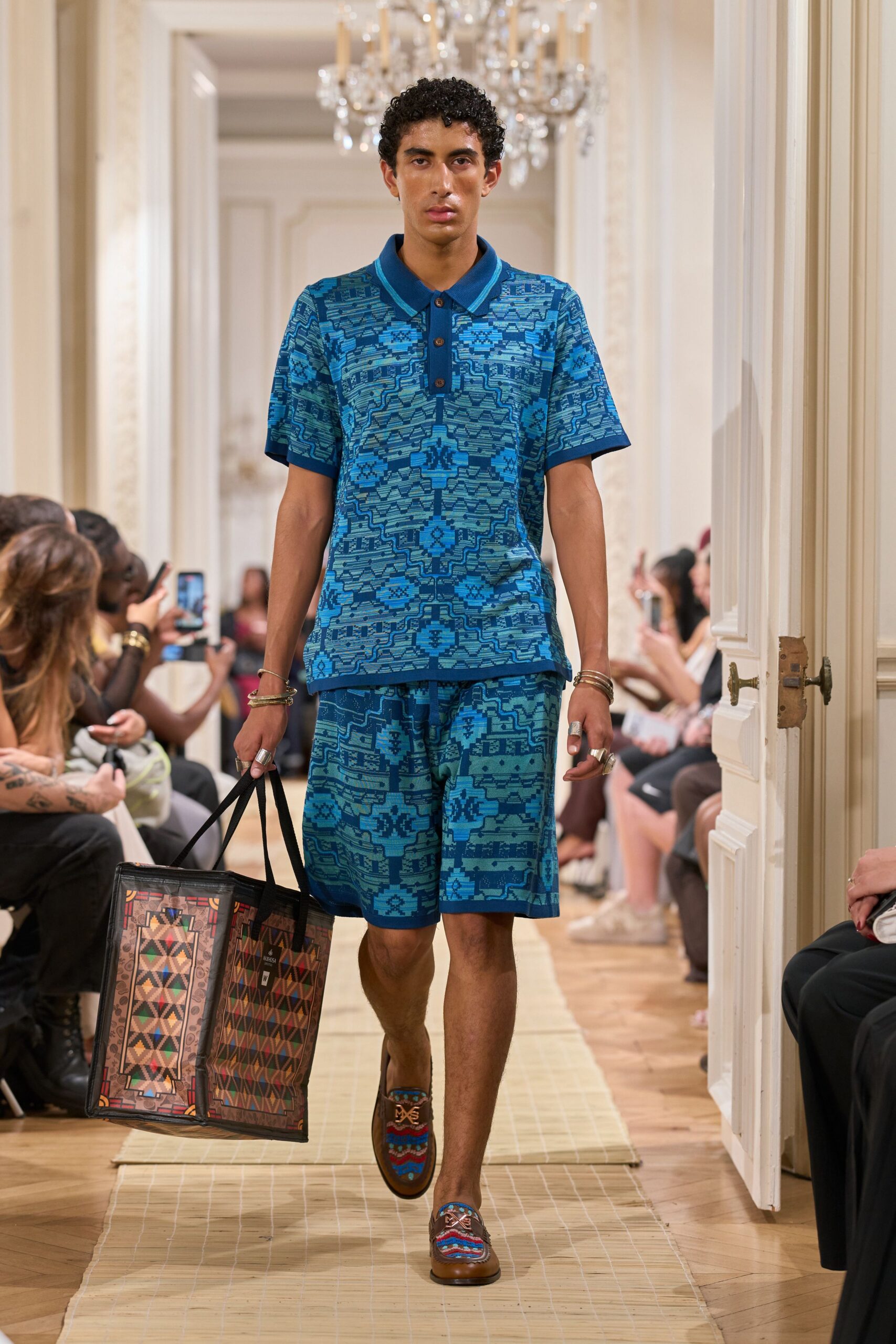blue patterned knit polo shirt