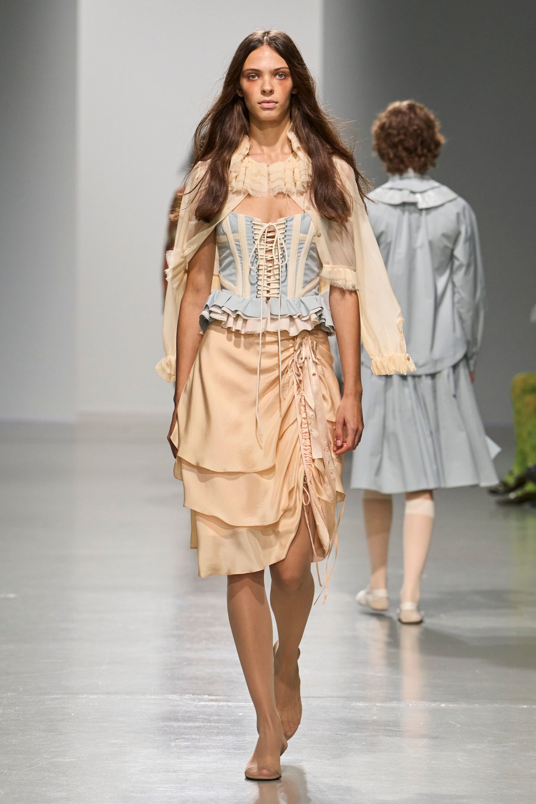lace-up corset with ruched wrap skirt