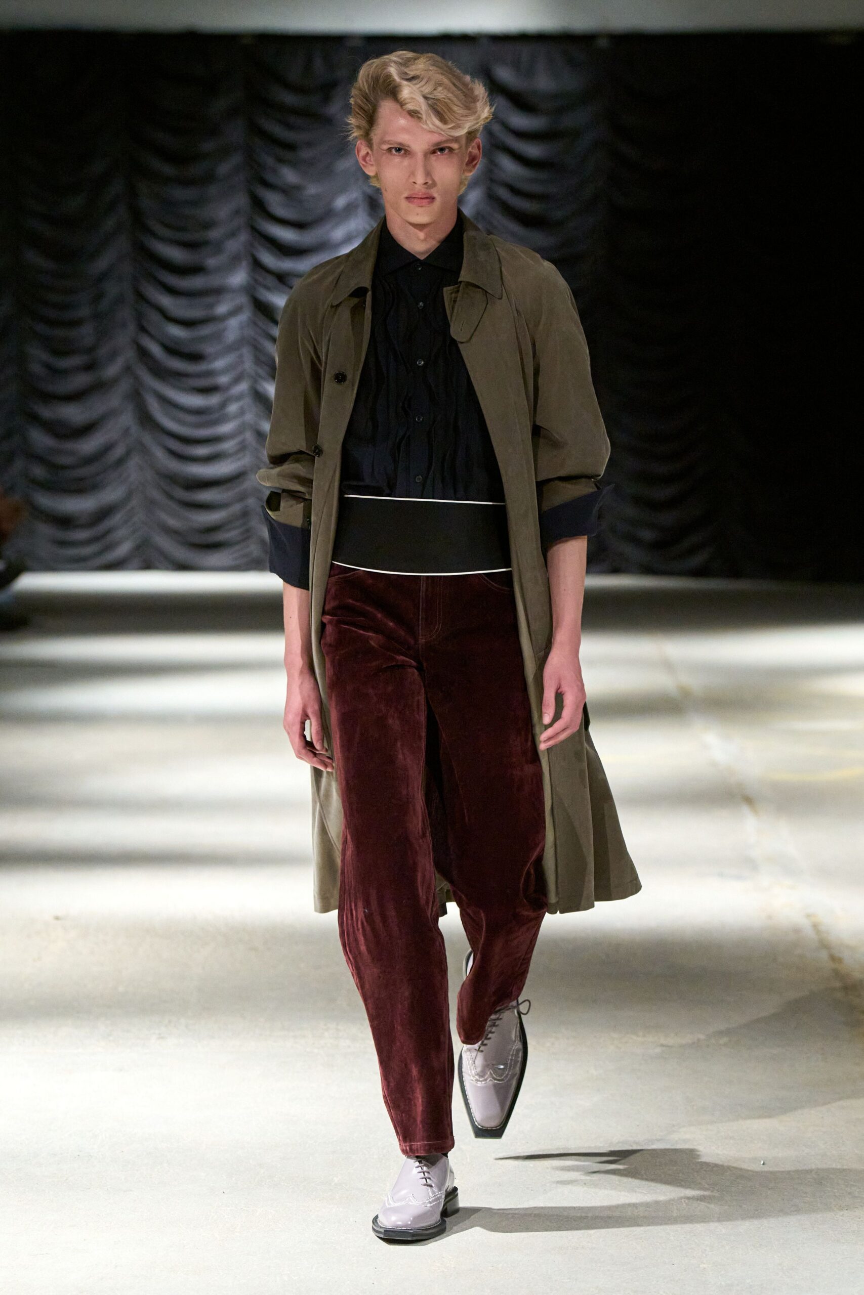 olive long coat with velvet trousers