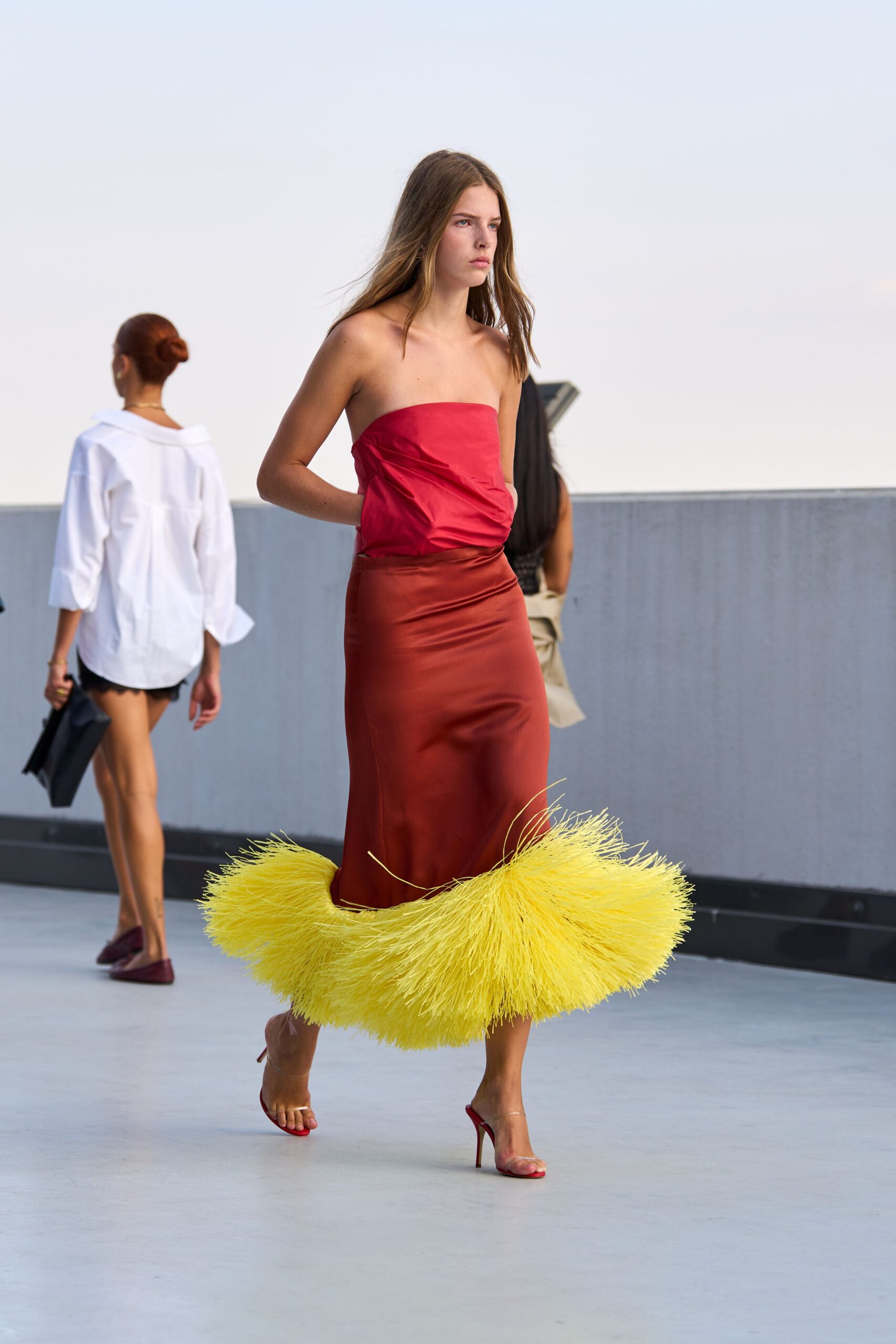 strapless feather-hem satin gown