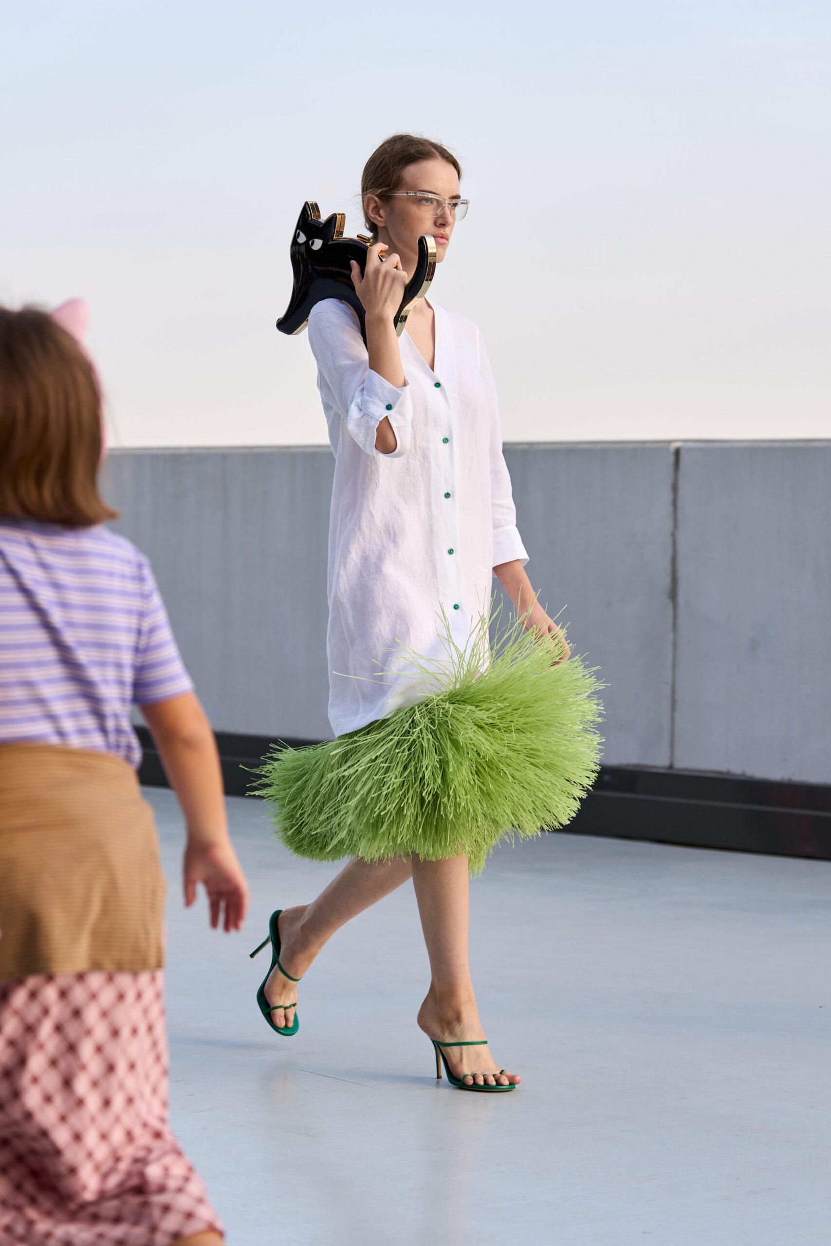 white shirt dress with feather skirt