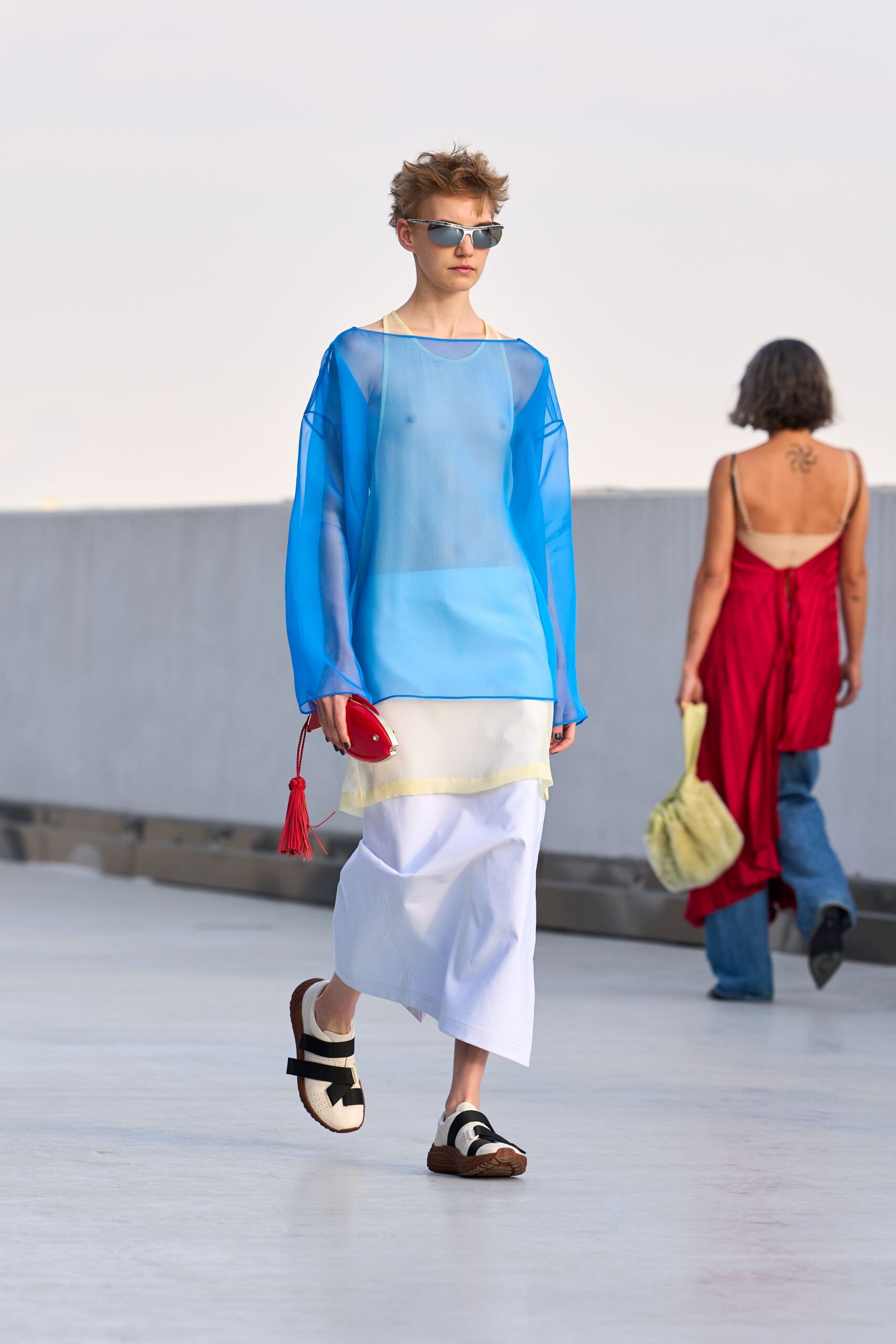 white unknown asymmetric flowing midi skirt