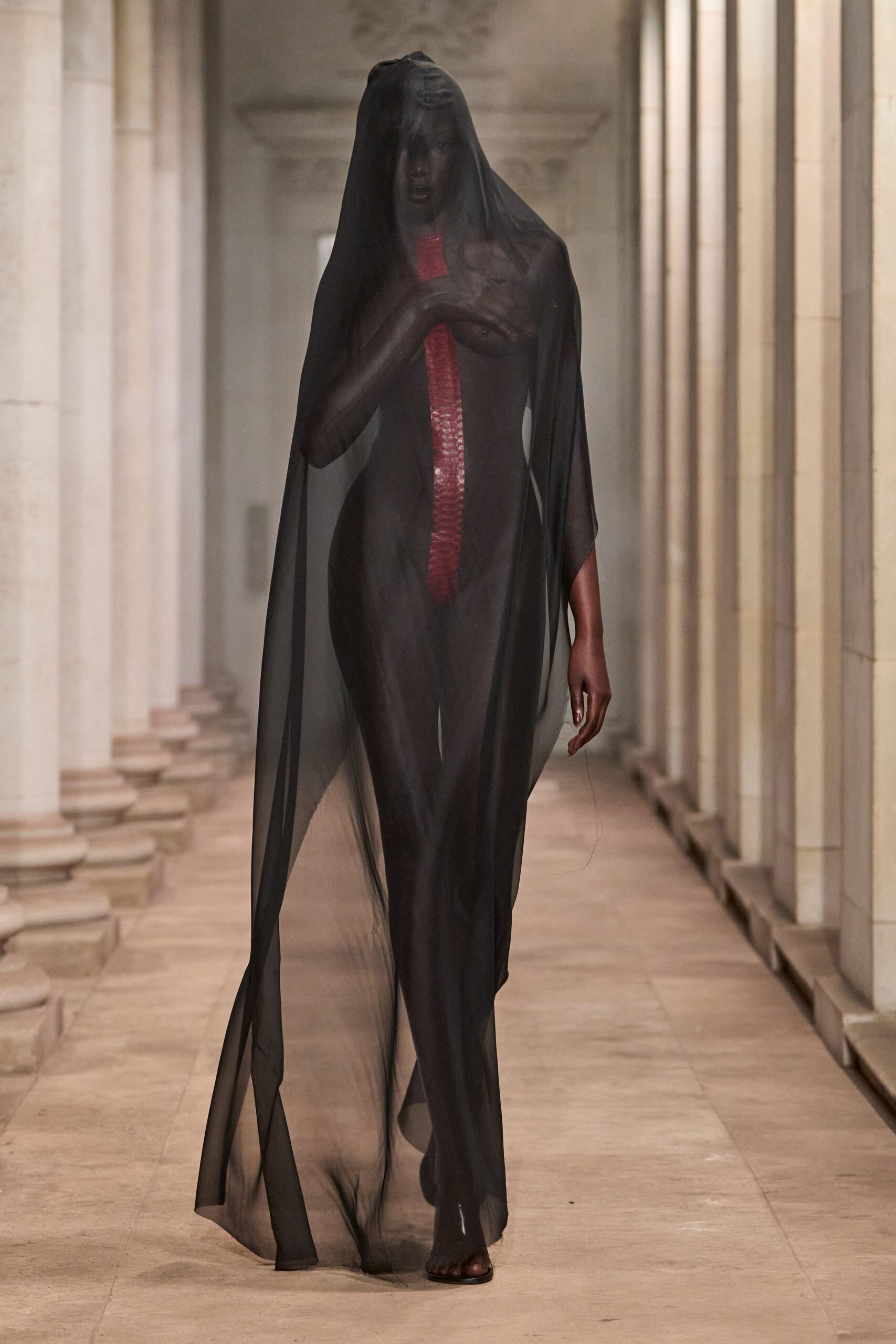 sheer black hooded evening gown