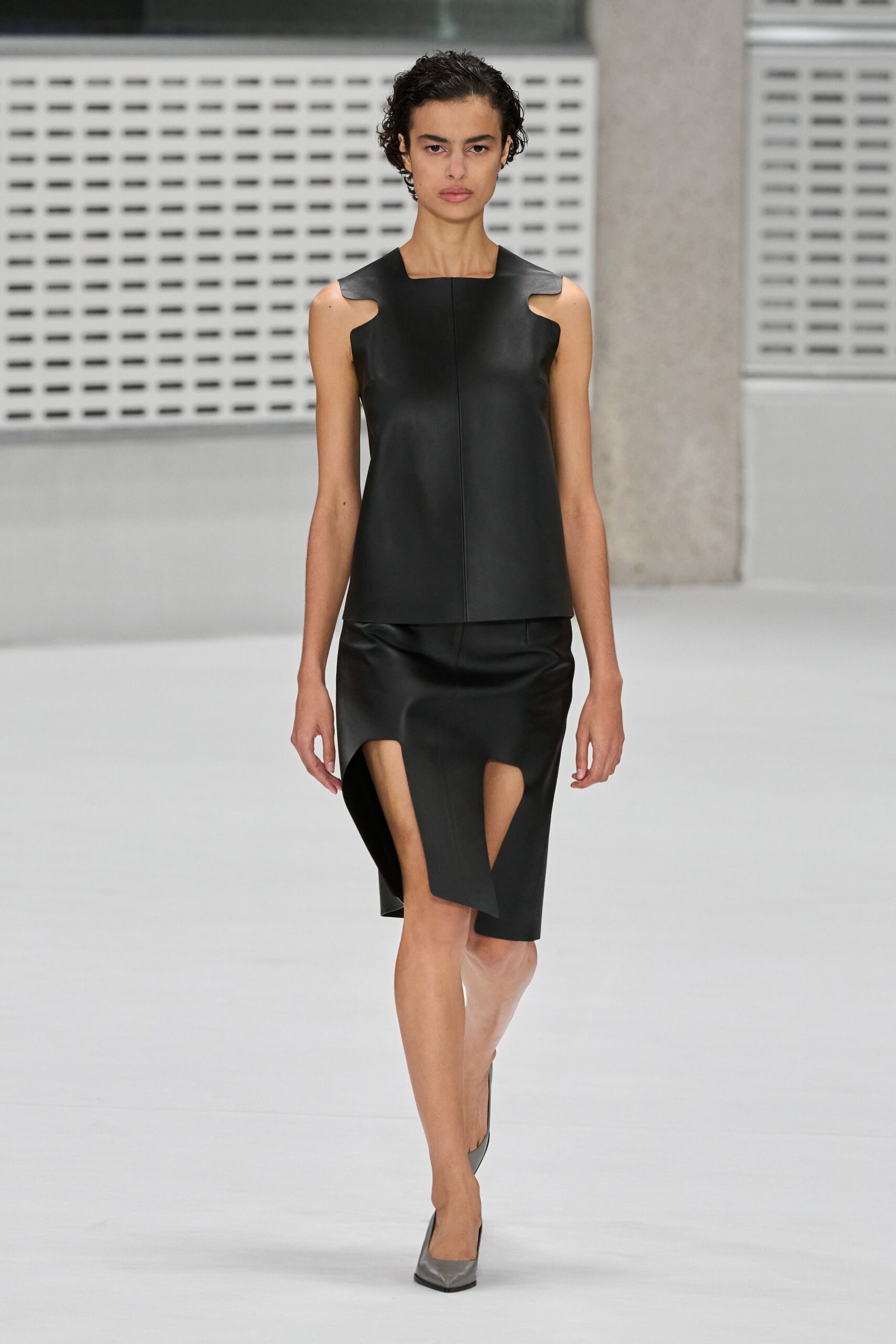 black leather asymmetric cutout fitted midi skirt