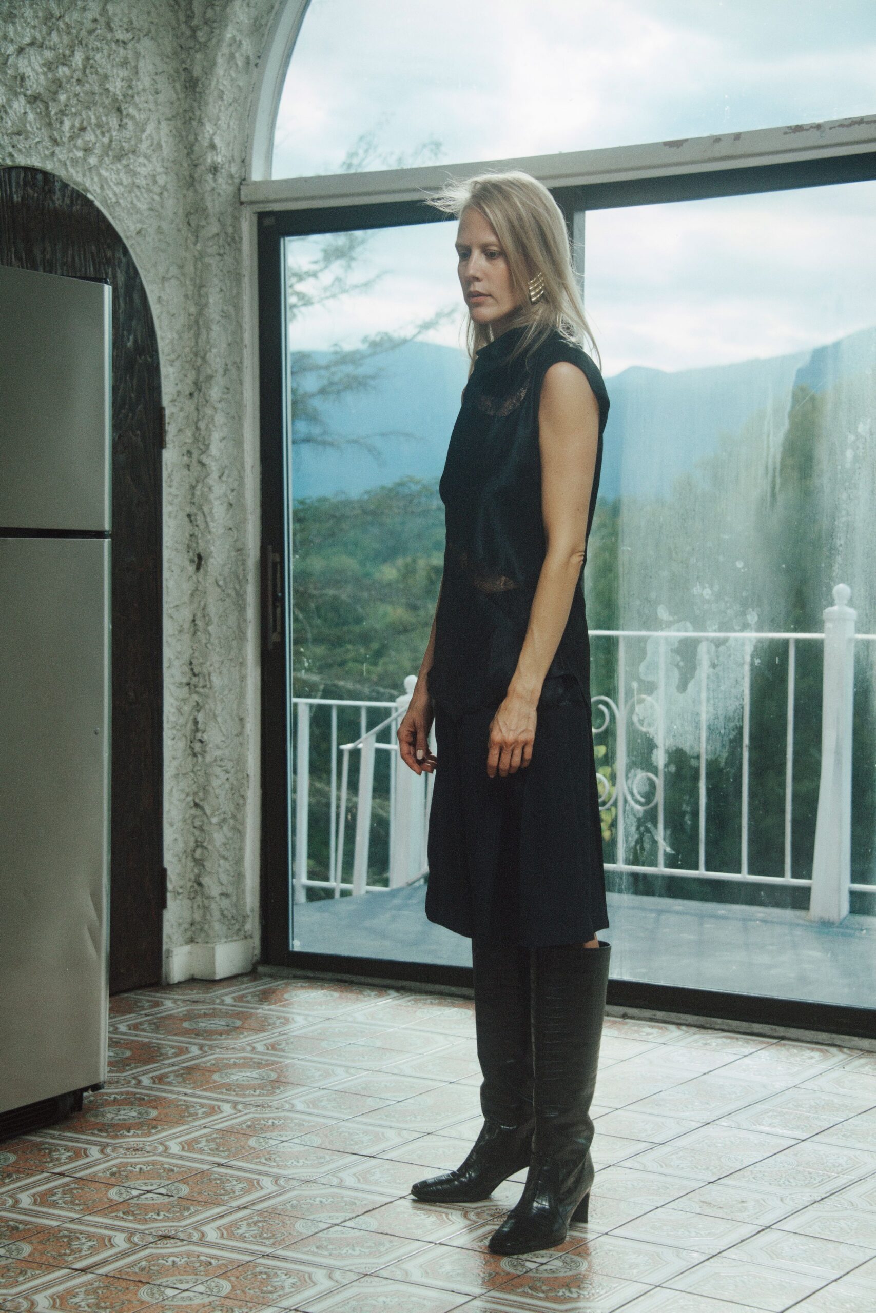 black sleeveless high-neck midi dress