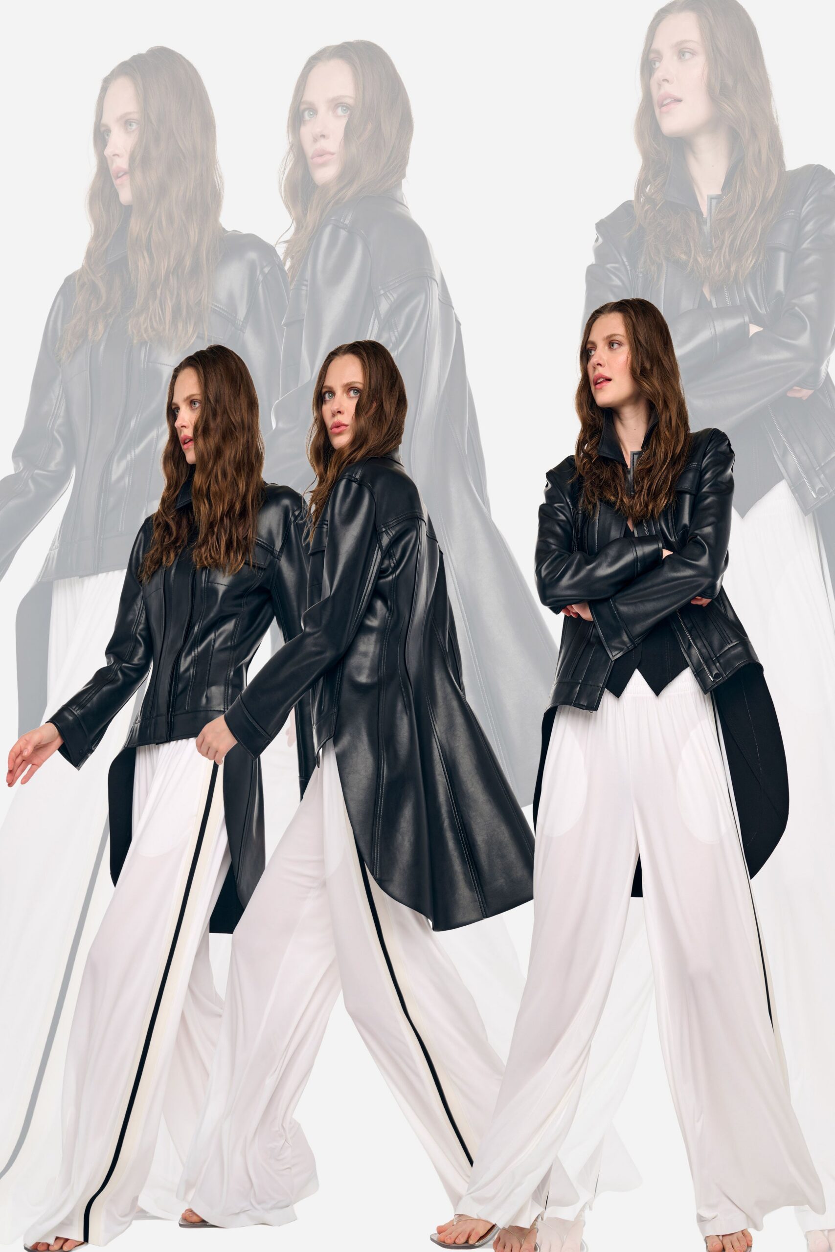 Black leather jacket with curved seaming and a wide folded collar. Black underlayer cut to a sharp pointed hem. White fluid wide-leg trousers with a black side stripe grazing the floor. Barely there metallic thong sandals. Crossing a hotel atrium before anyone else is up.
