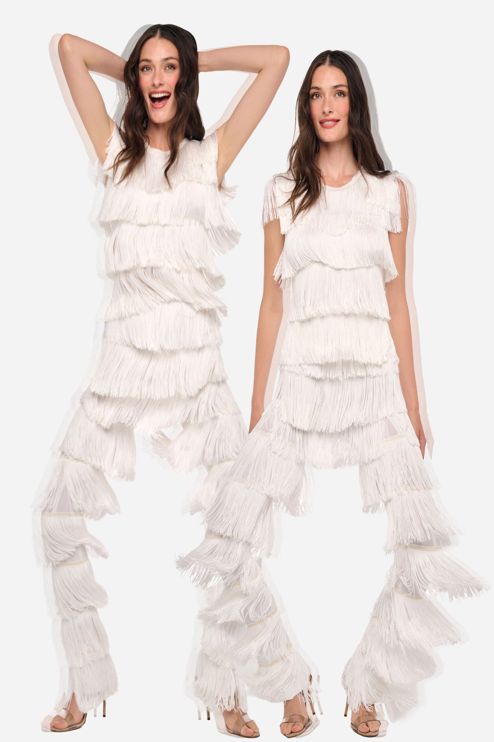 Ivory cap-sleeve top buried under tiered fringe, shoulder strands hanging longest. Matching flared trousers banded in dense fringe, sheer mesh peeking between tiers. Clear strap heels with slim metallic stilettos. For dancing through a hotel ballroom after the band has stopped.