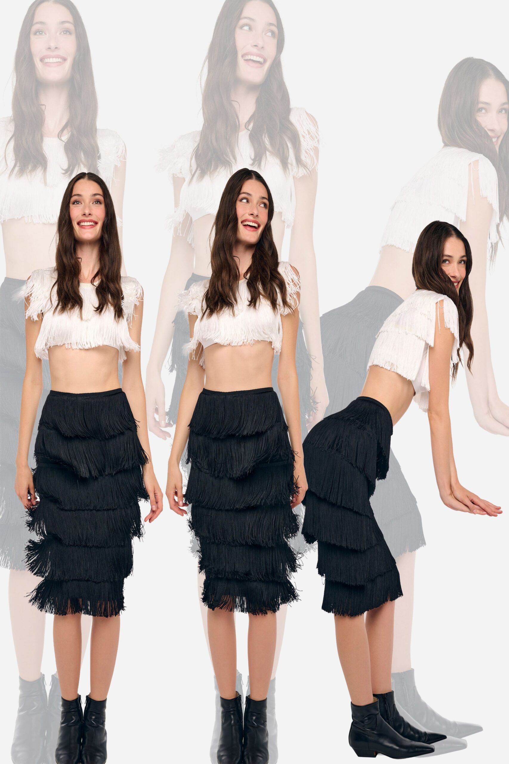White cropped top banded in dense fringe, with feathery cap sleeves. Black midi skirt built from five cascading fringe tiers. Black leather ankle boots with narrow pointed toes. Walking from the dance floor to the terrace before the song ends.