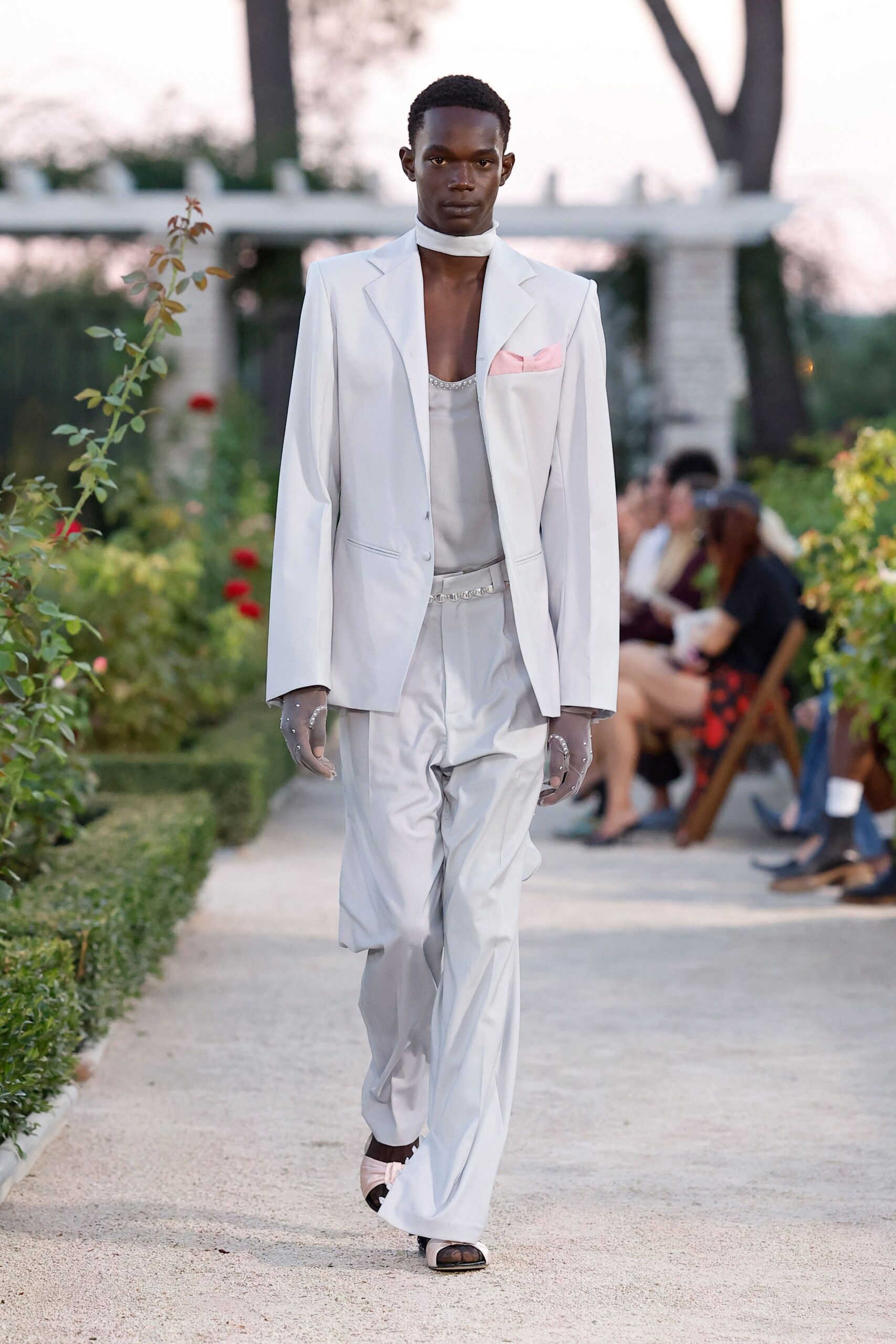 white tailored blazer with satin trousers