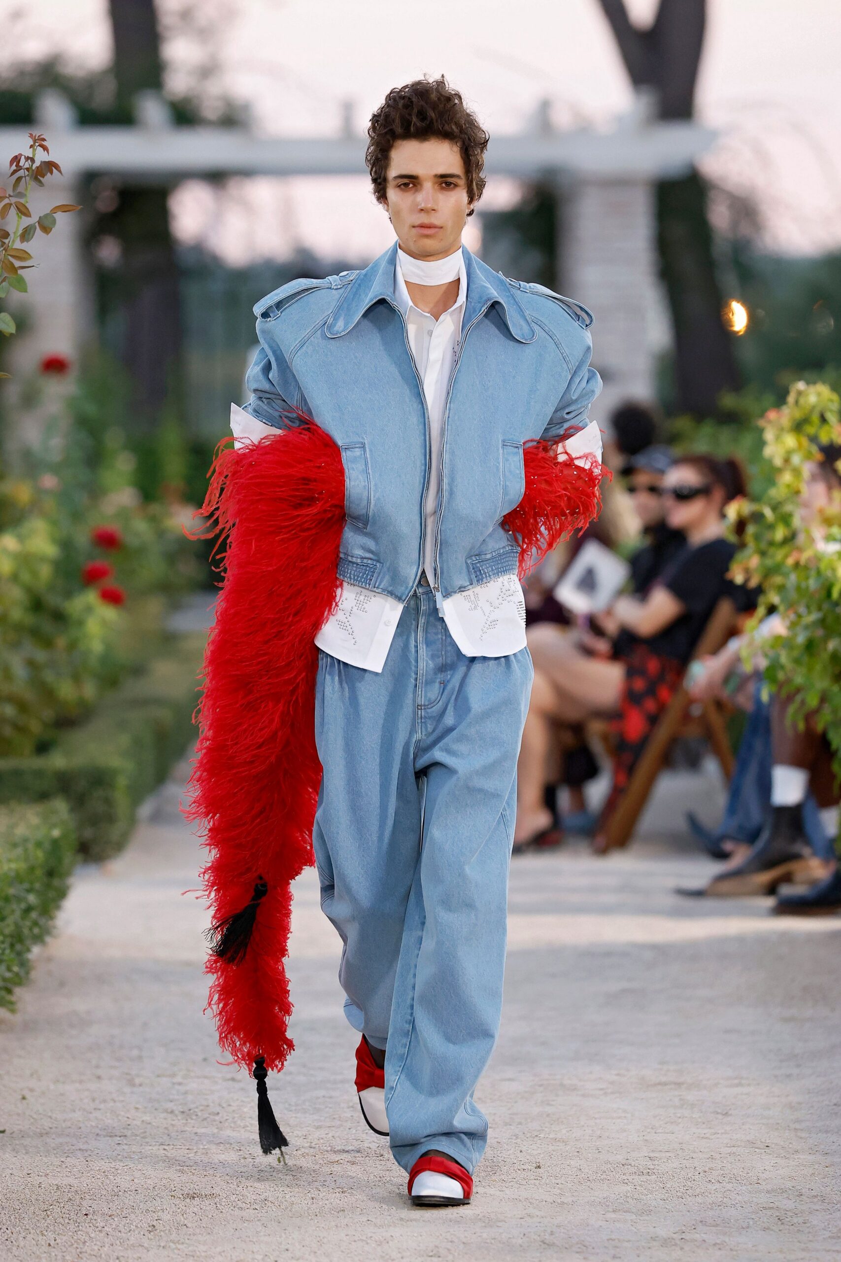 oversized denim jacket with exaggerated shoulders