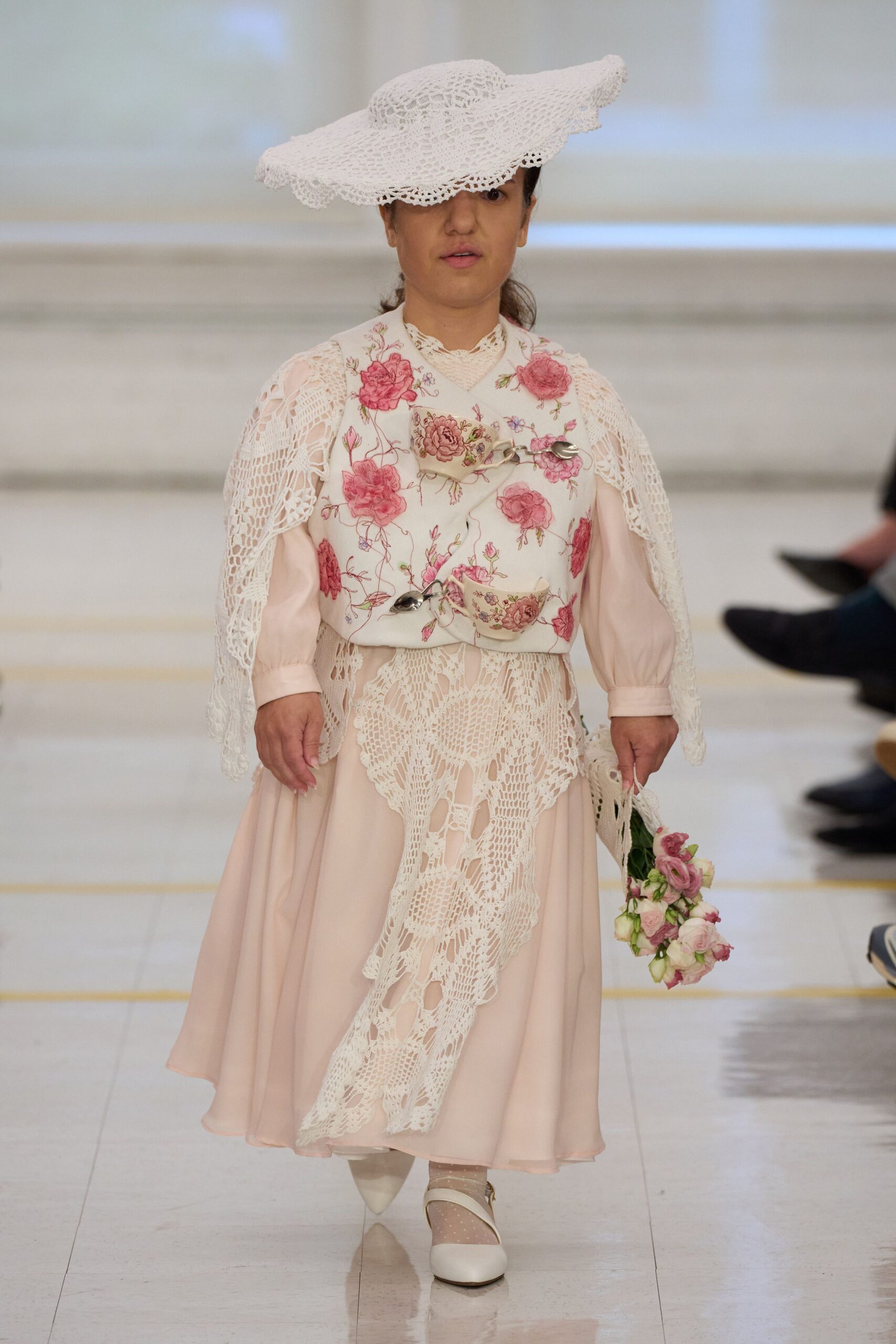 floral wrap vest over lace dress