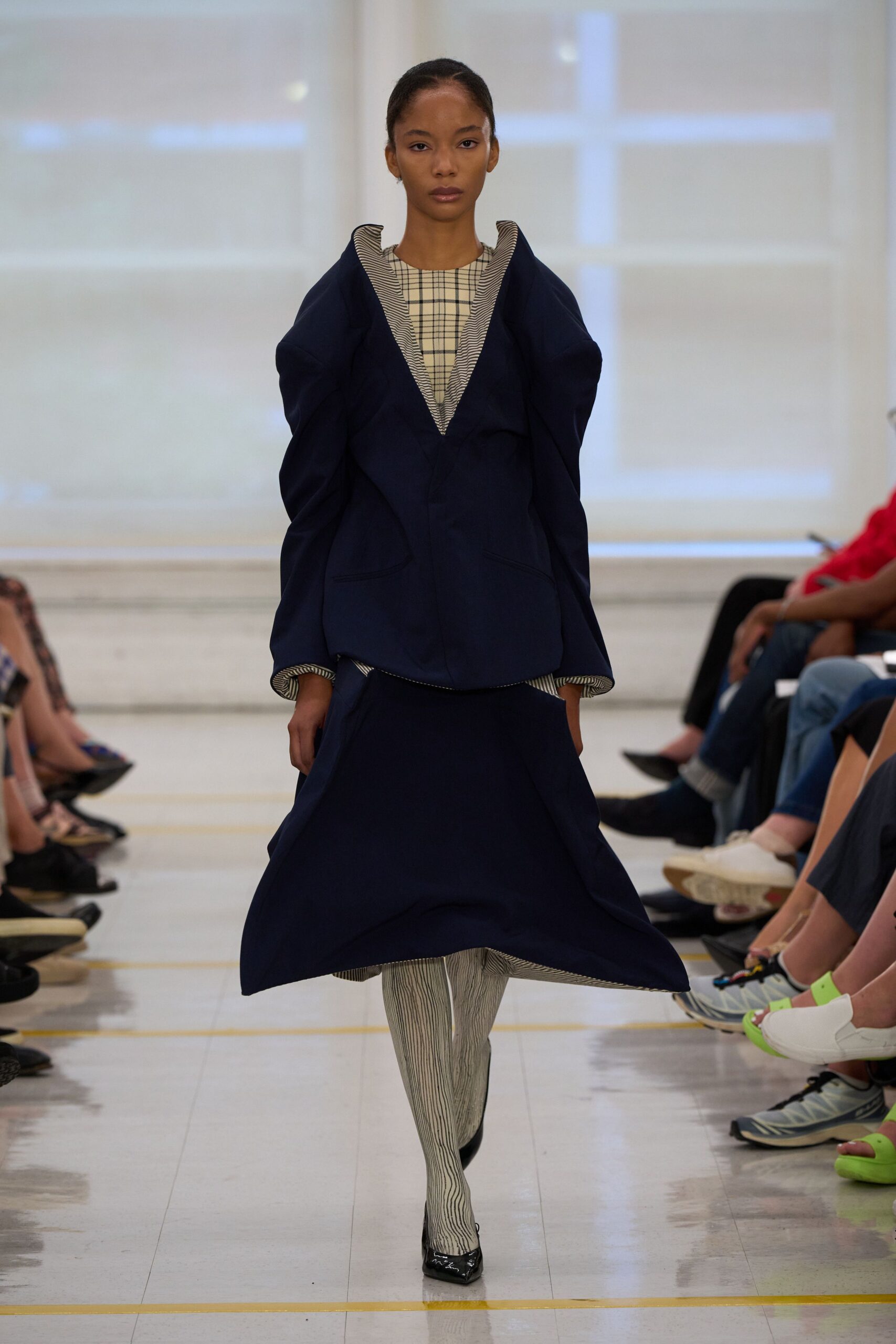 sculptural navy peplum jacket