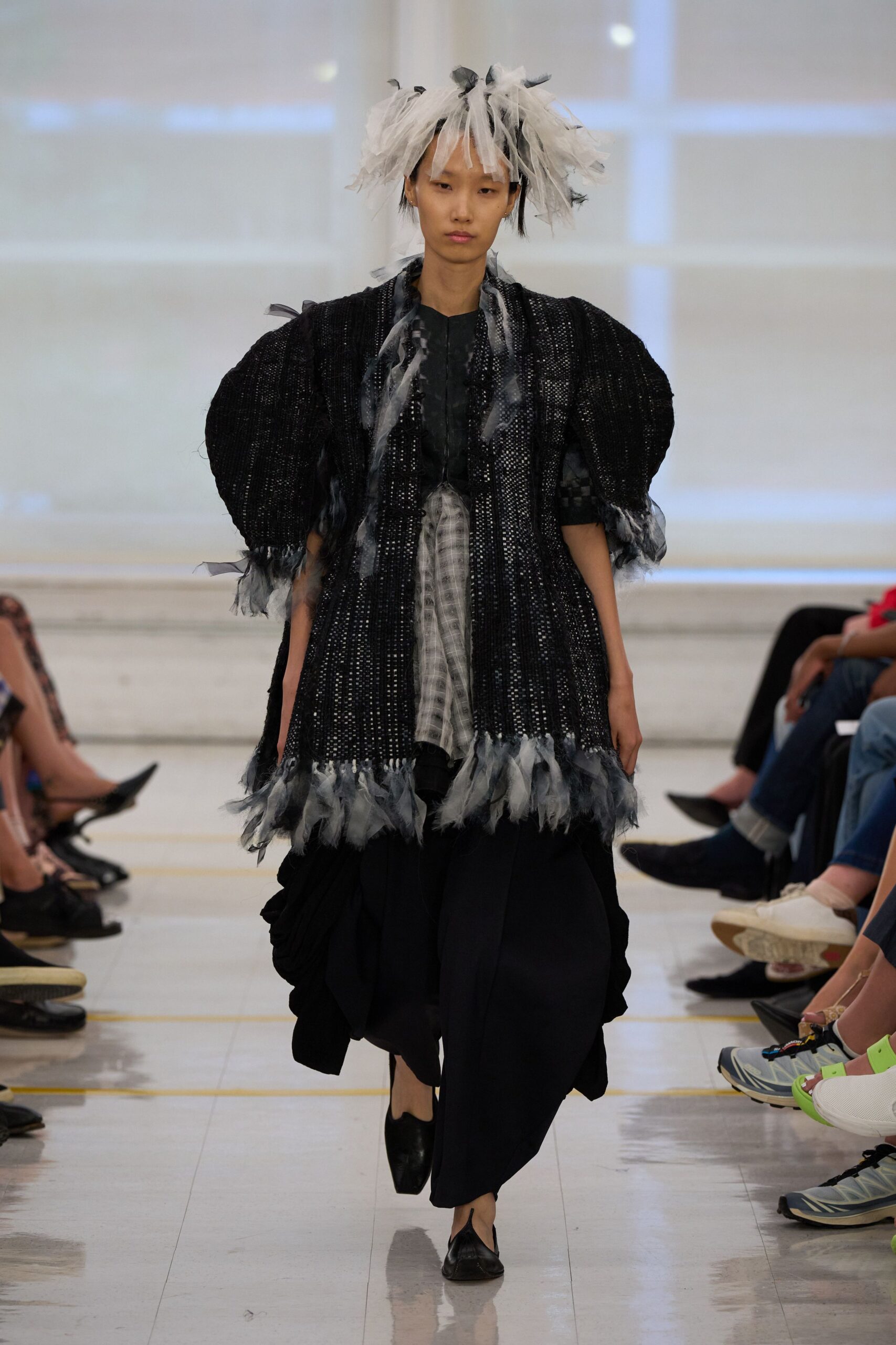 black textured puff-sleeve jacket