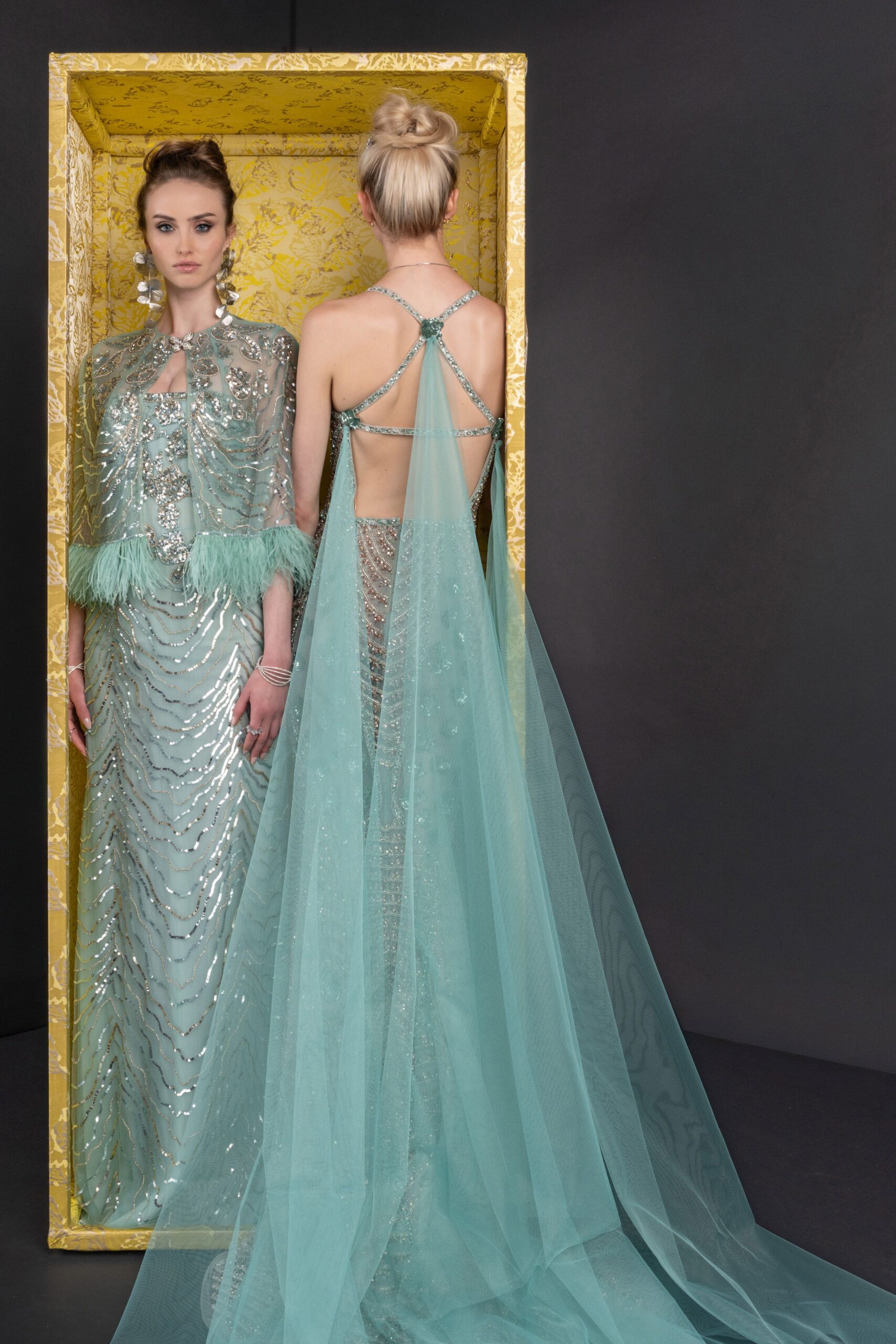 seafoam embellished cape-back evening gown