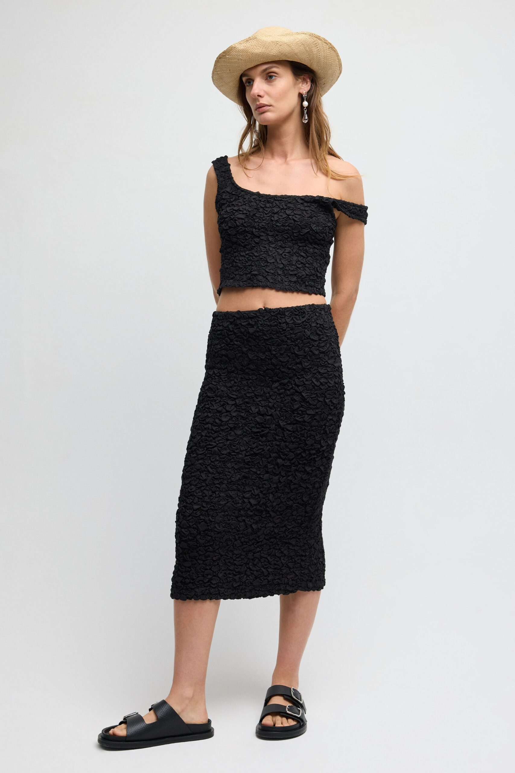 black textured off-shoulder crop top