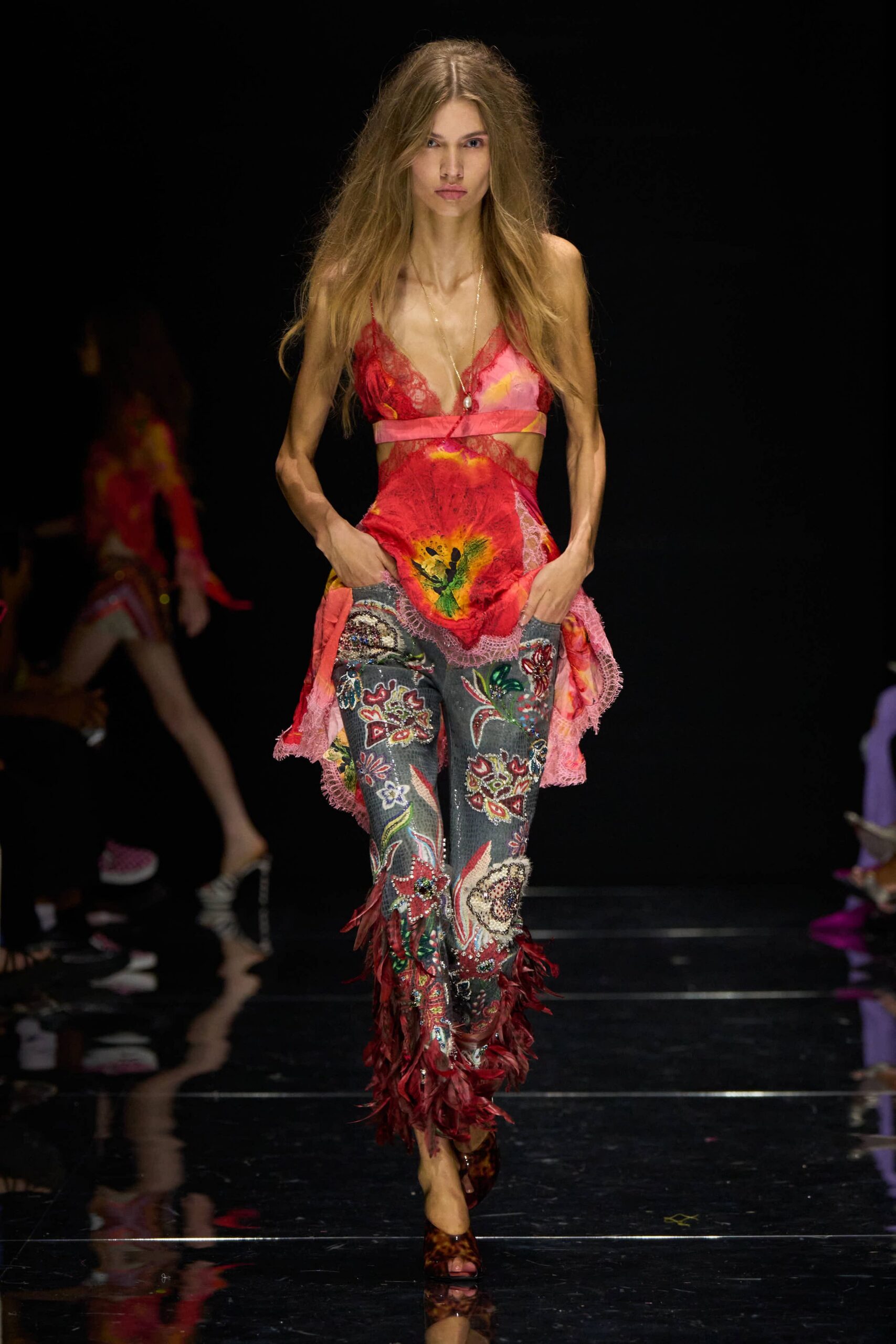 Cutout slip top in hot pink lace and painted floral satin. Long gold chain with a single pearl drop at the sternum. Grey denim trousers crusted with sequined paisleys and red feathered hems. Brown satin mules peeking under the feathers. Walking back from the fair with glitter still stuck to your hands.