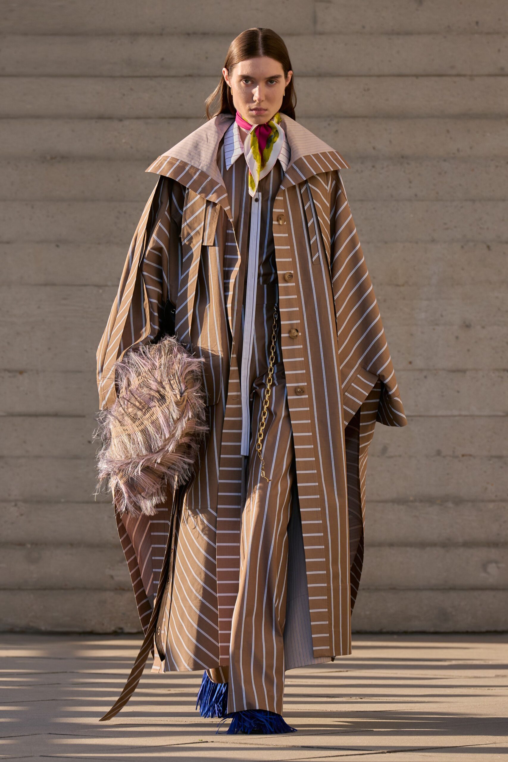 striped cape-like trench coat
