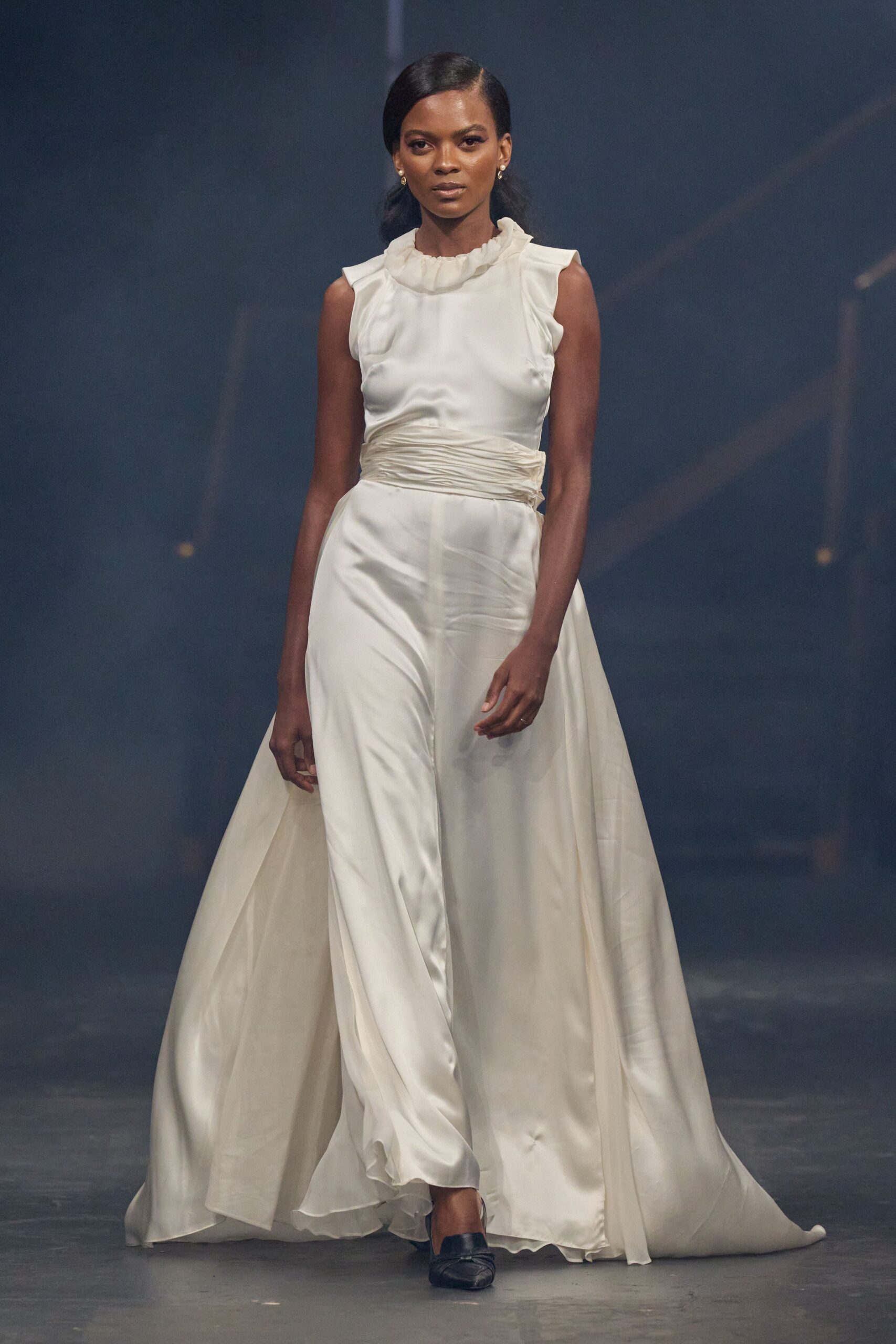 ivory satin sleeveless high-neck ruched draped gown
