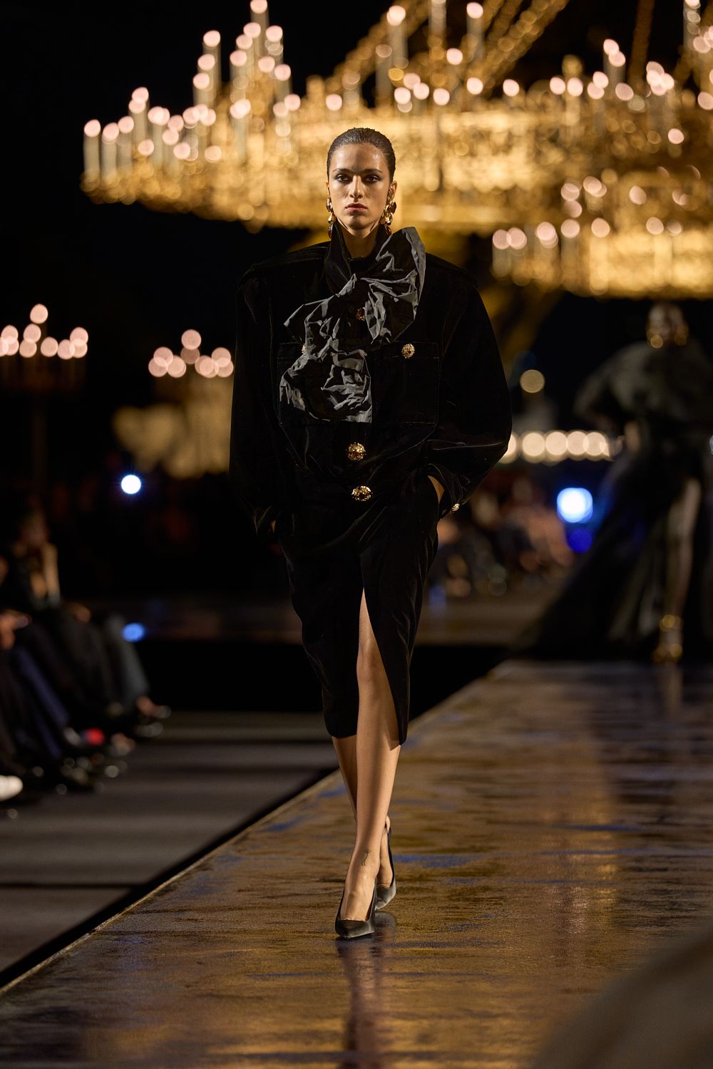 black velvet dress with sculptural neck drape