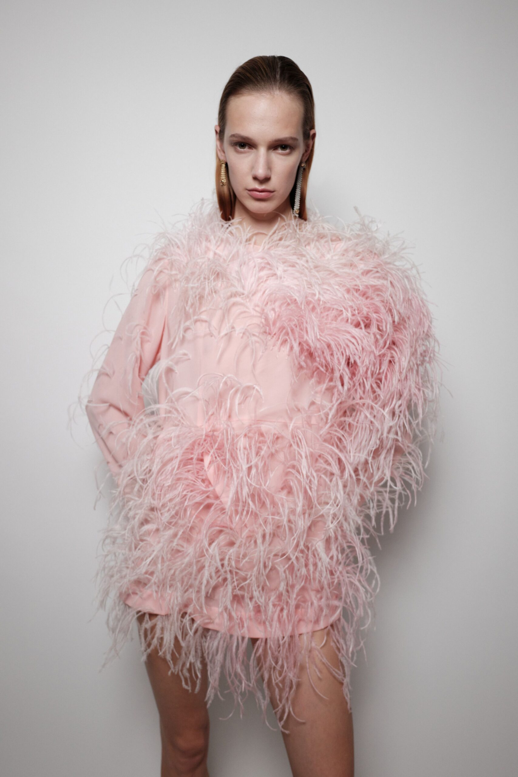 pink feathered mini dress