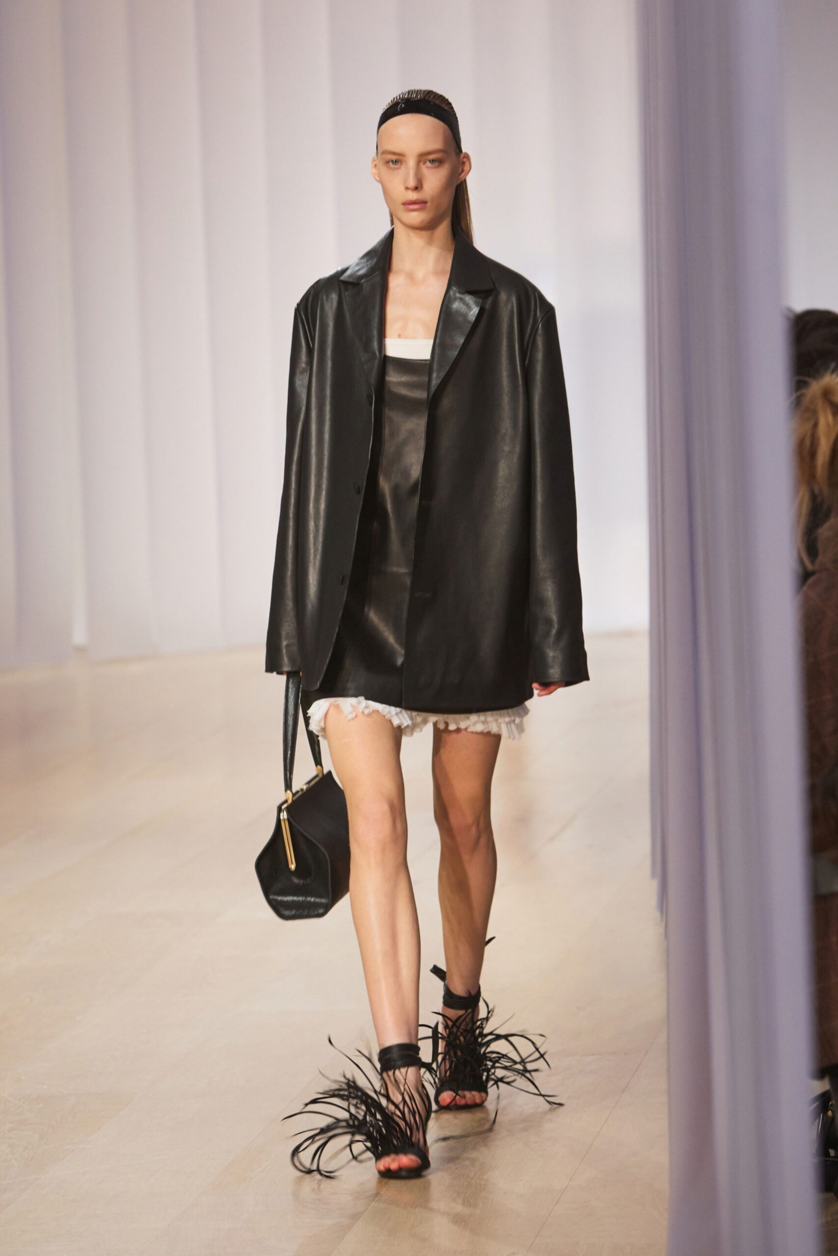 black leather square-neck sleeveless ruffled mini mini-dress