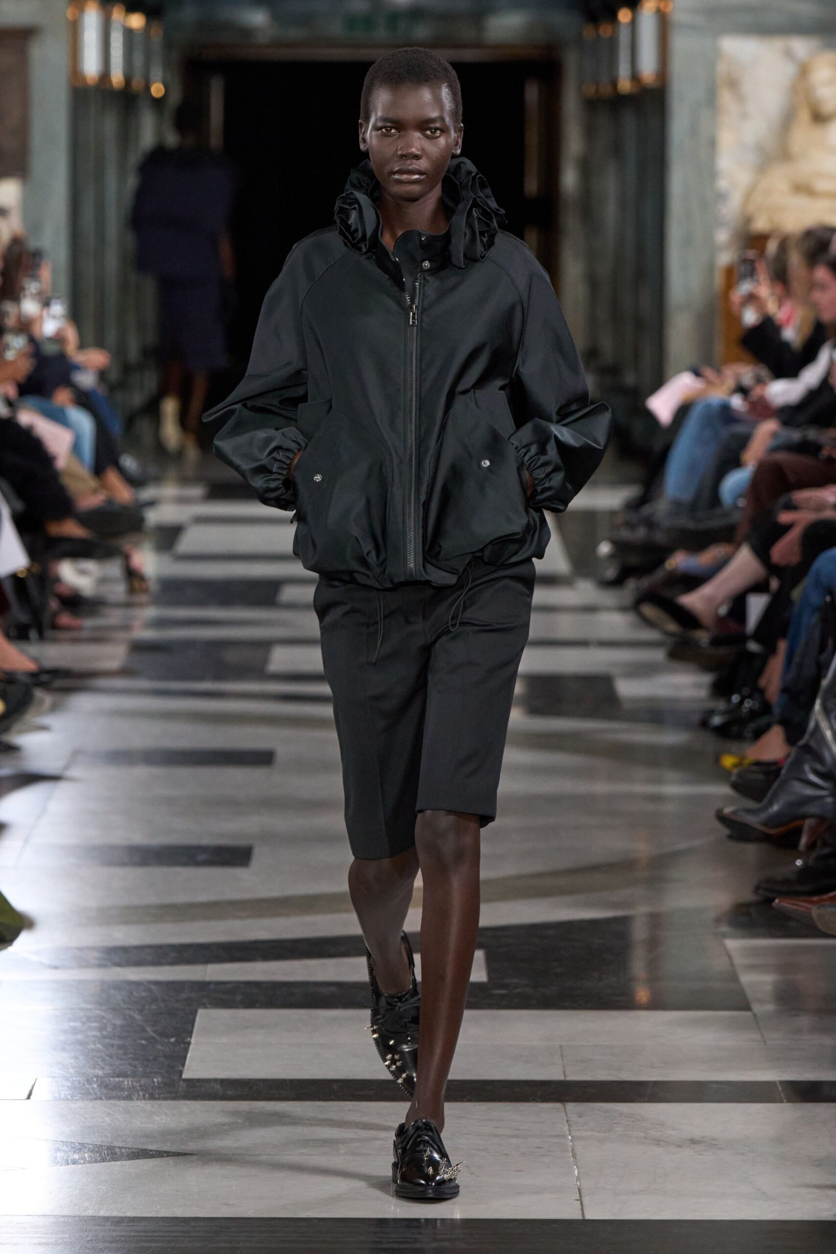 ruffle-collar black windbreaker jacket