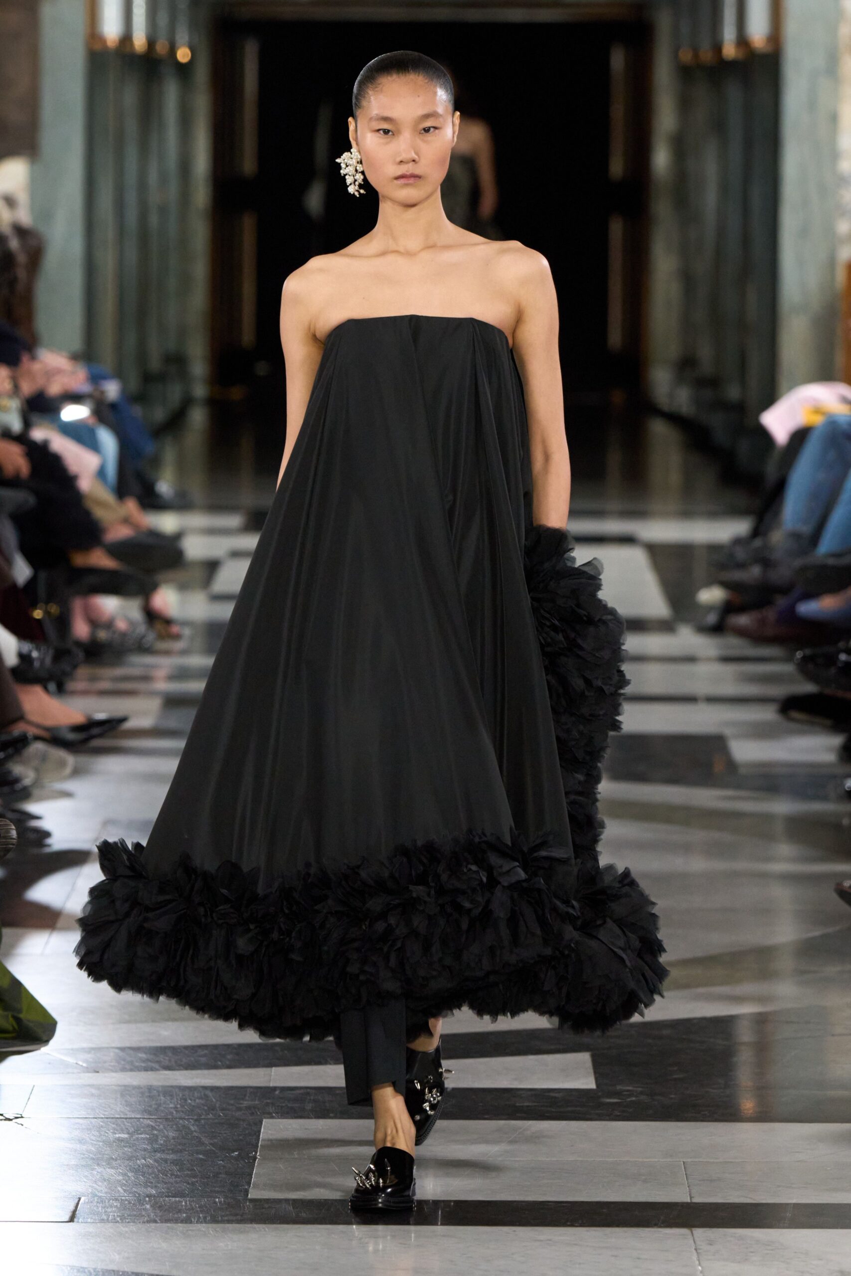 black strapless ruffled hem gown