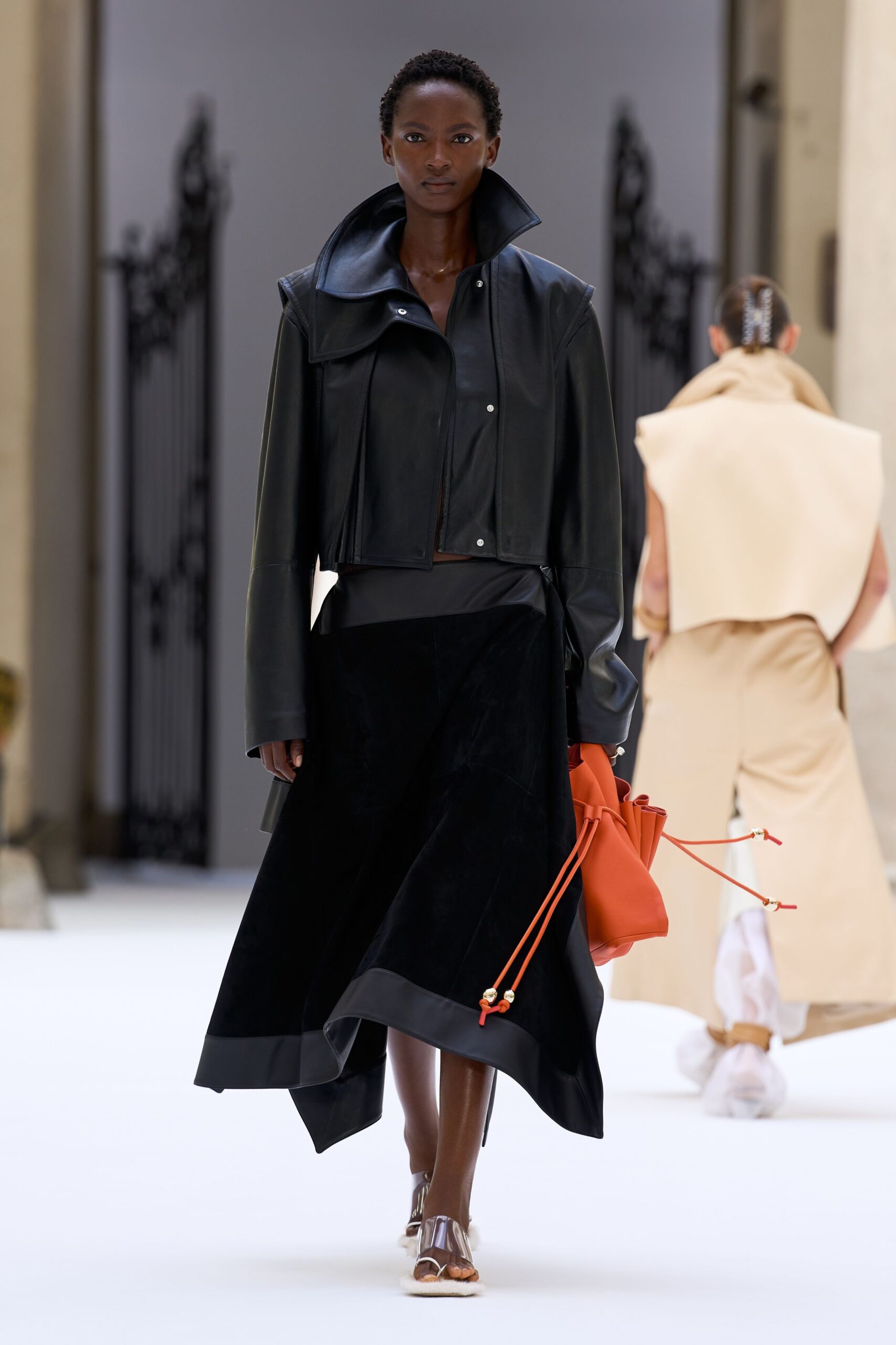 black unknown asymmetric panelled flowing textured midi skirt