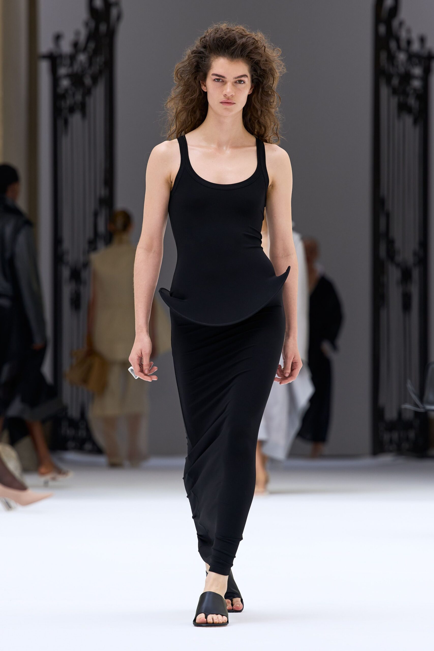 black jersey sleeveless scoop-neck fitted draped flowing dress