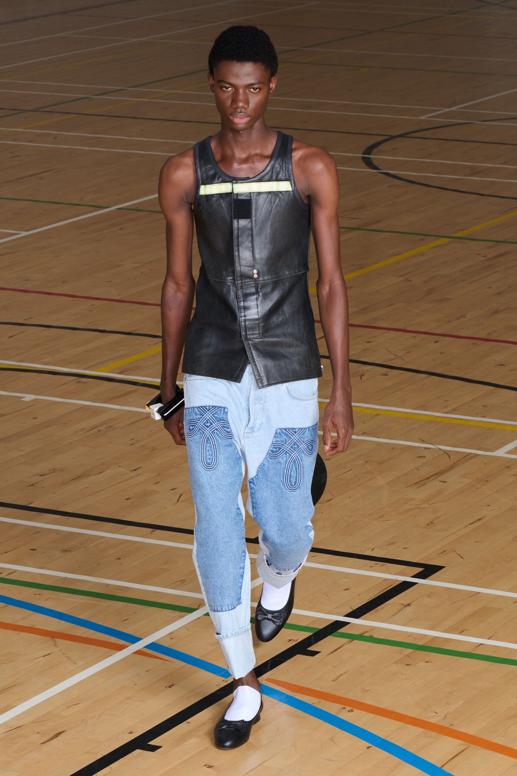 black leather apron-style top