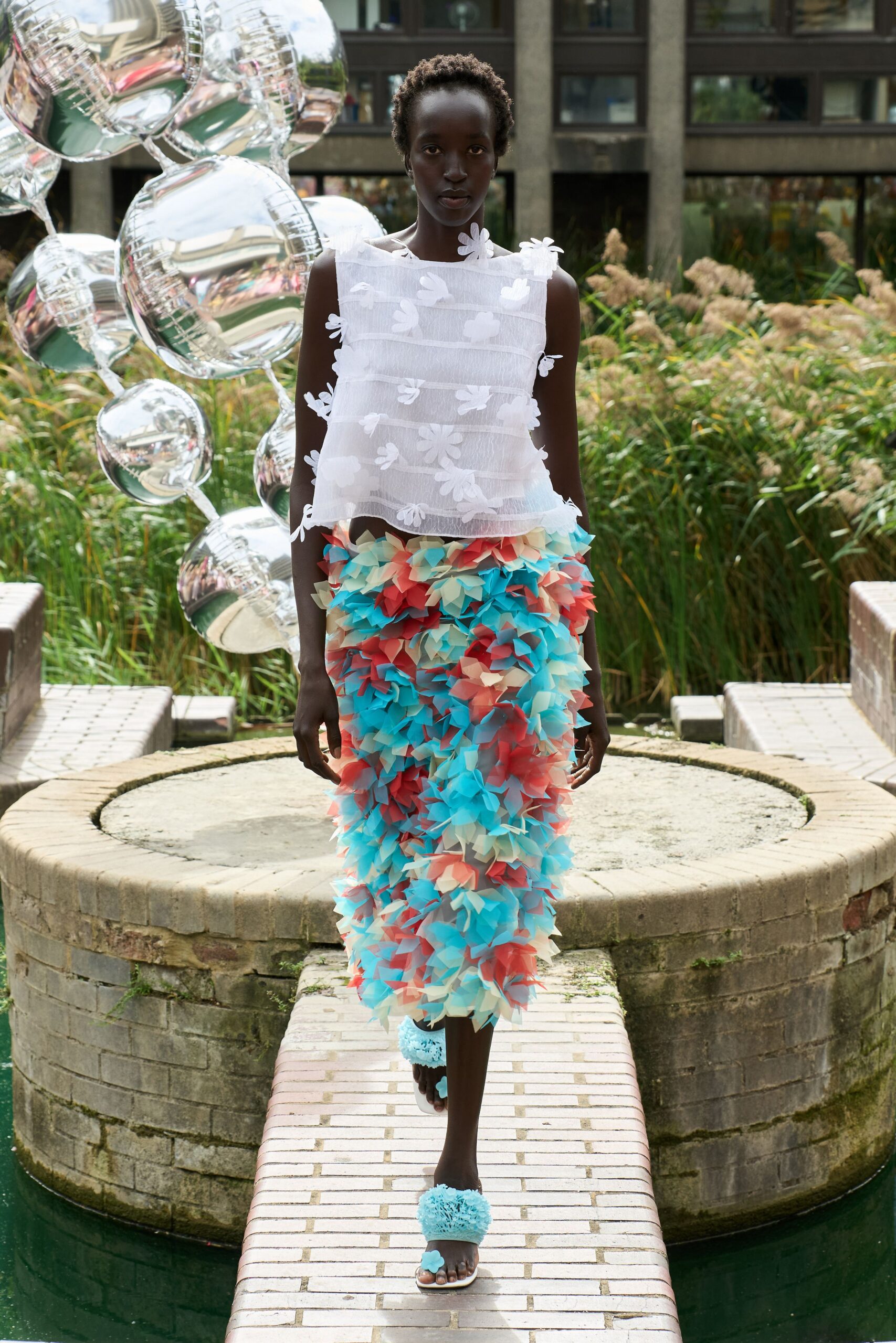 white organza sleeveless boat-neck embroidered ruffled top