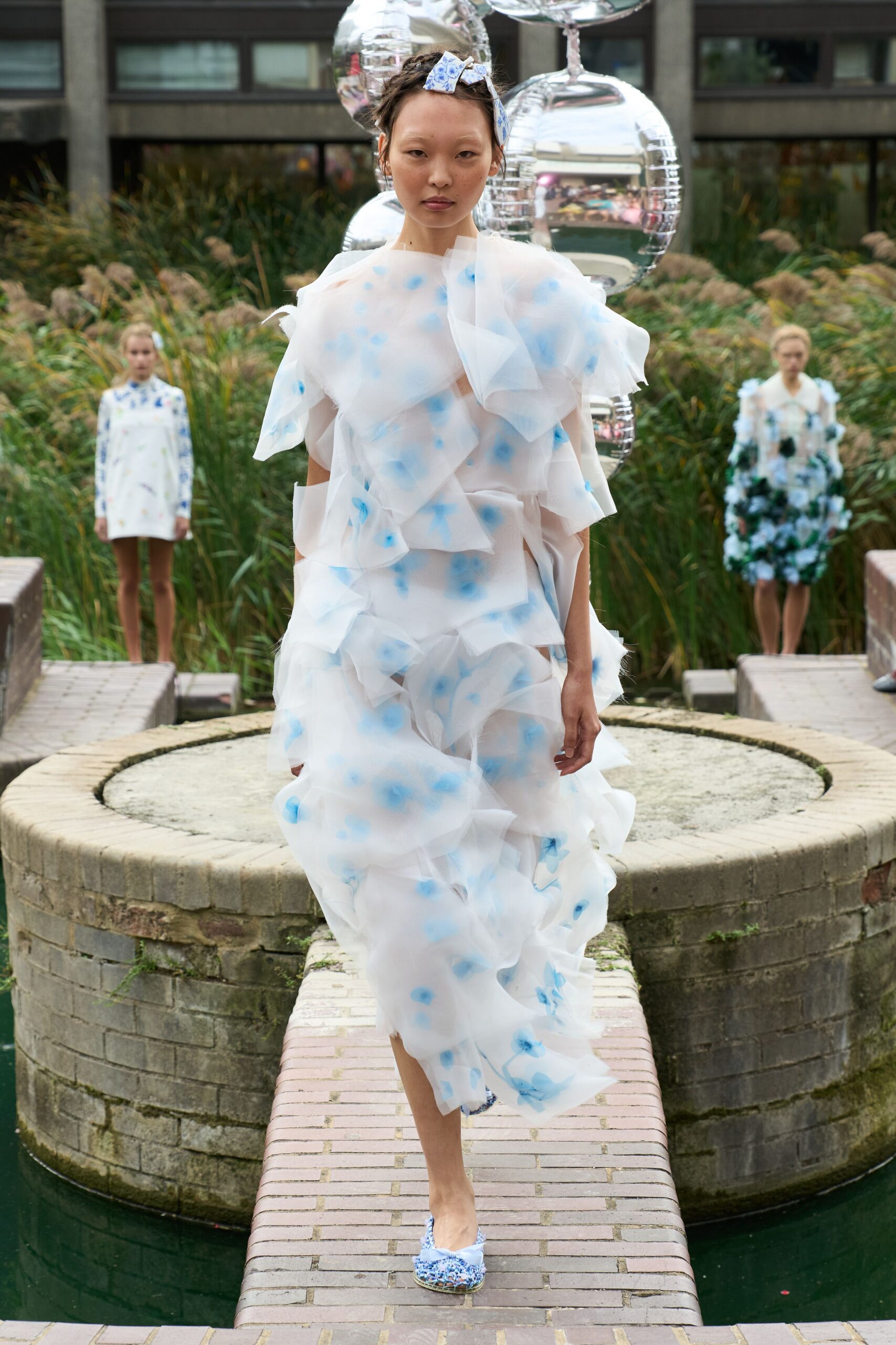 white organza short-sleeve high-neck ruffled printed gown