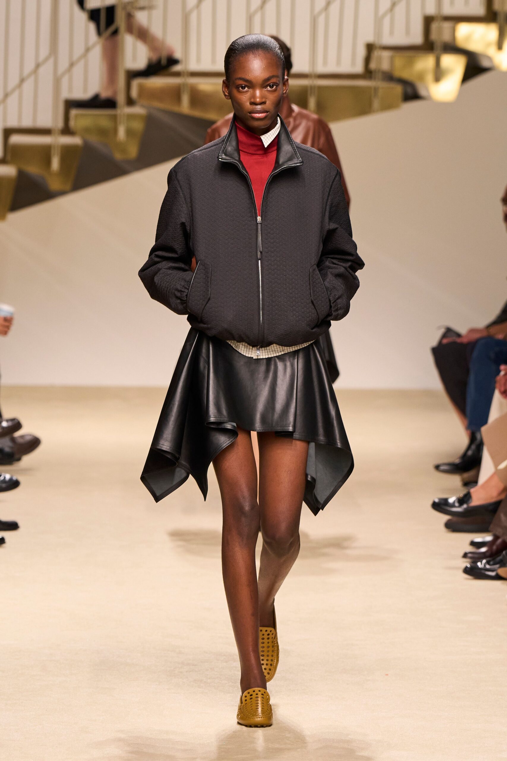 black leather asymmetric flared shiny mini skirt
