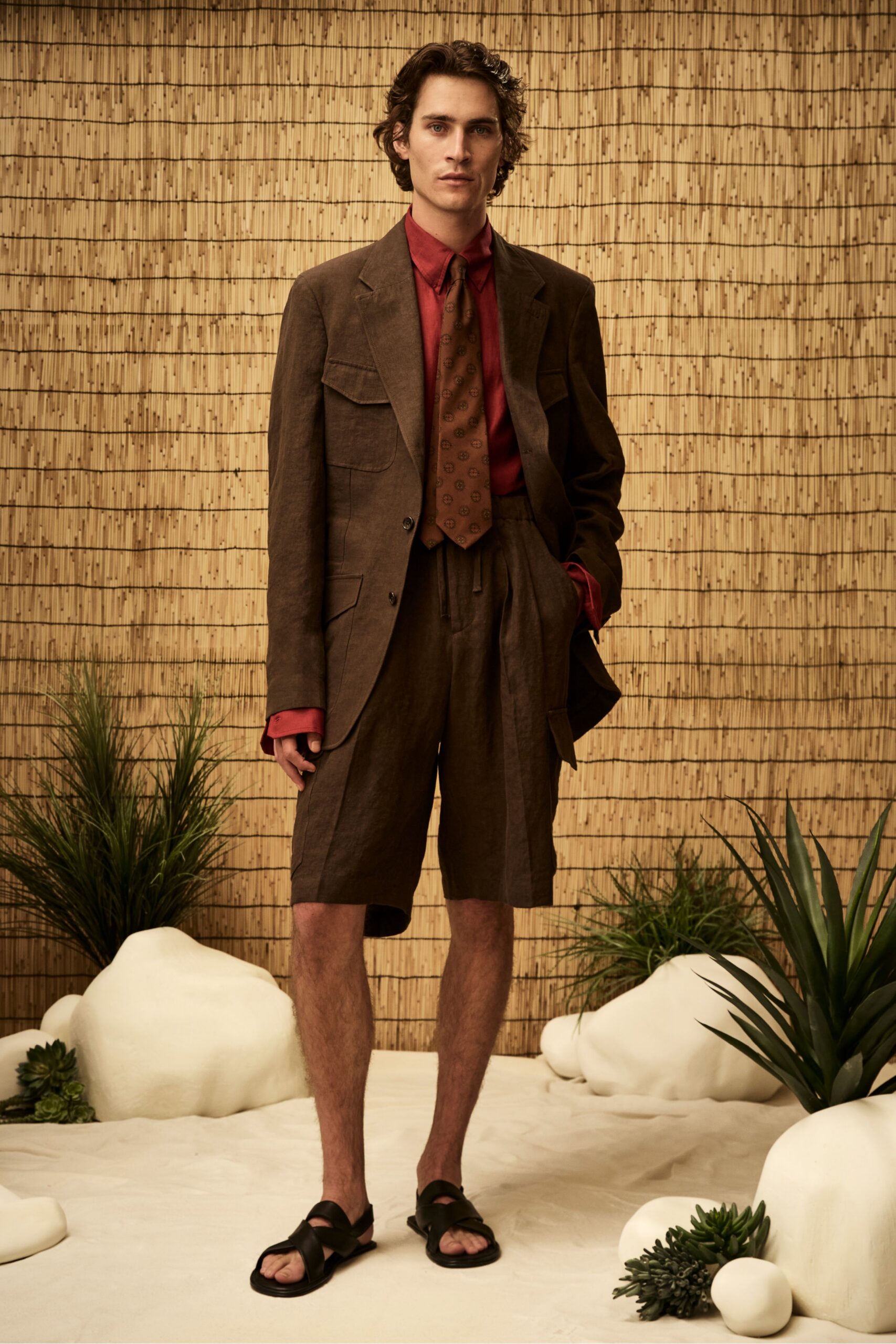 brown linen blazer and Bermuda shorts