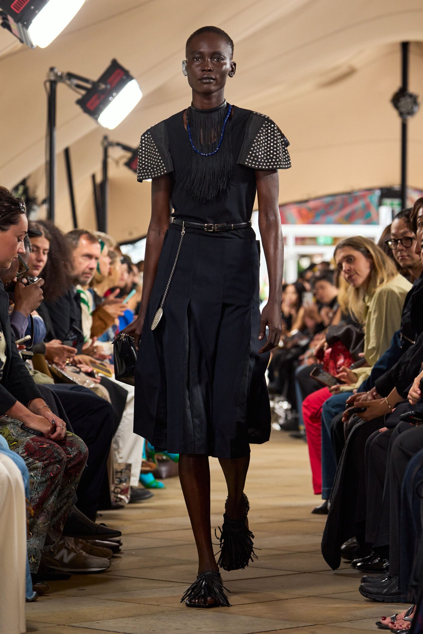black pleated midi skirt