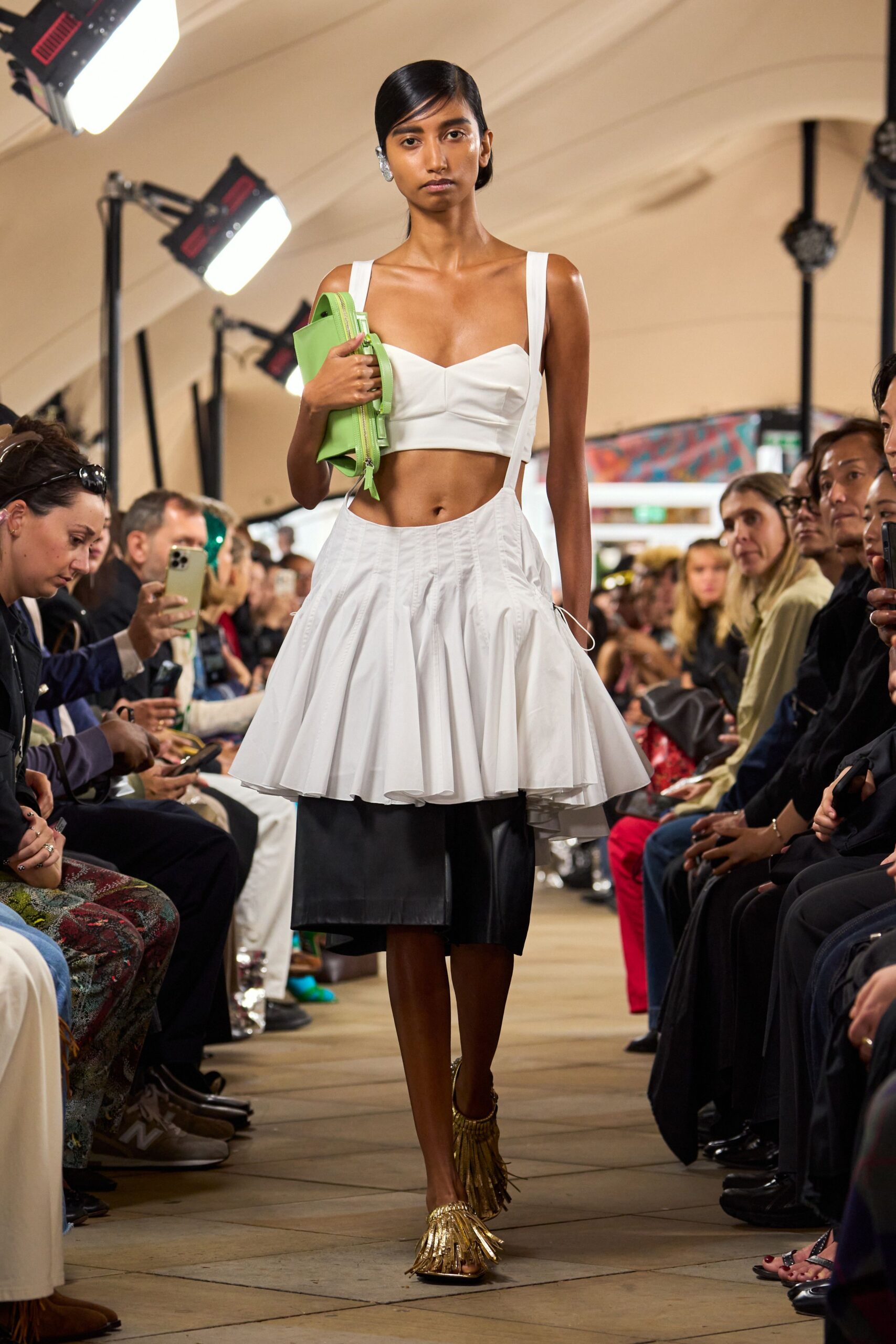 white bustier crop top and layered skirt