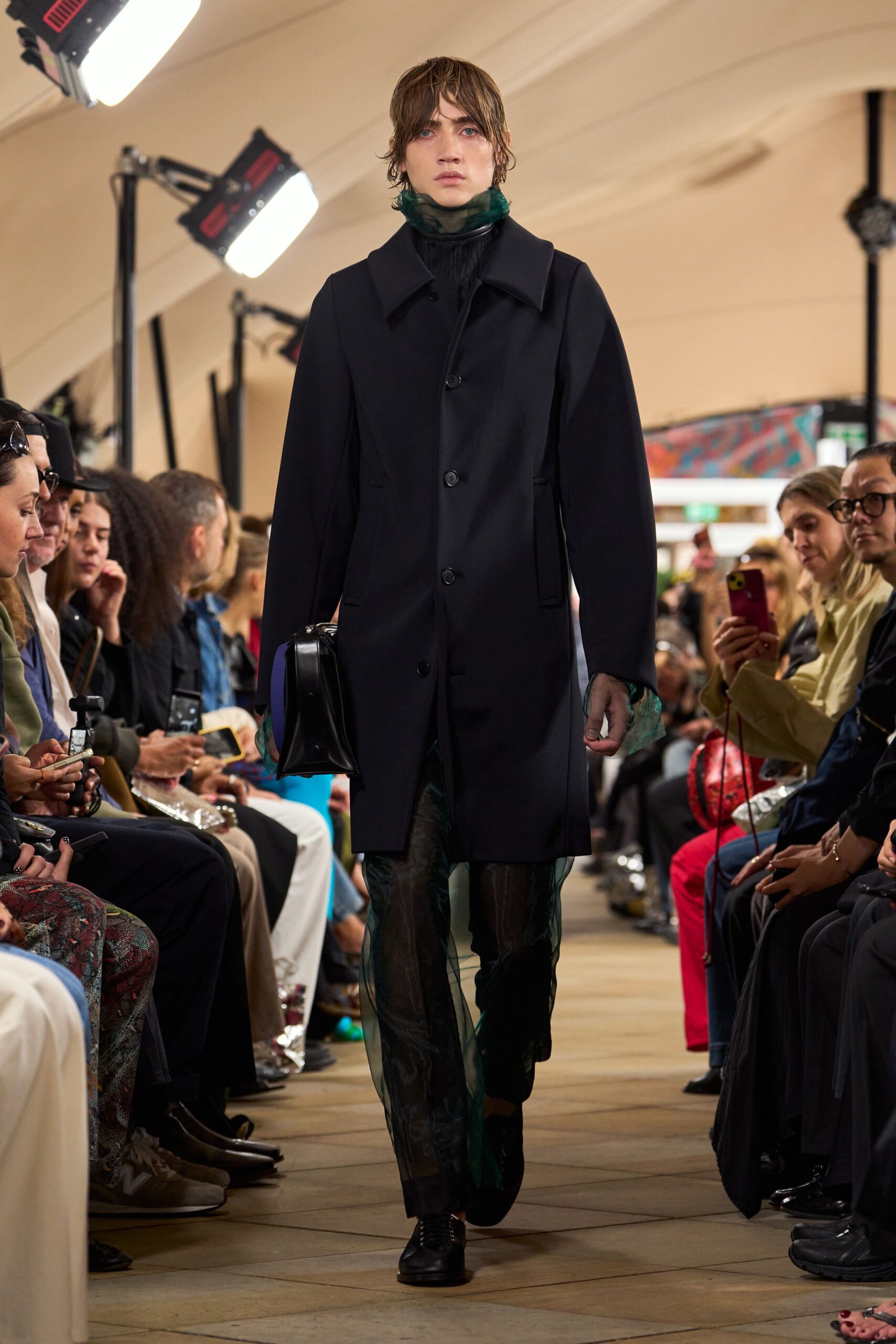 black car coat with sheer green layers