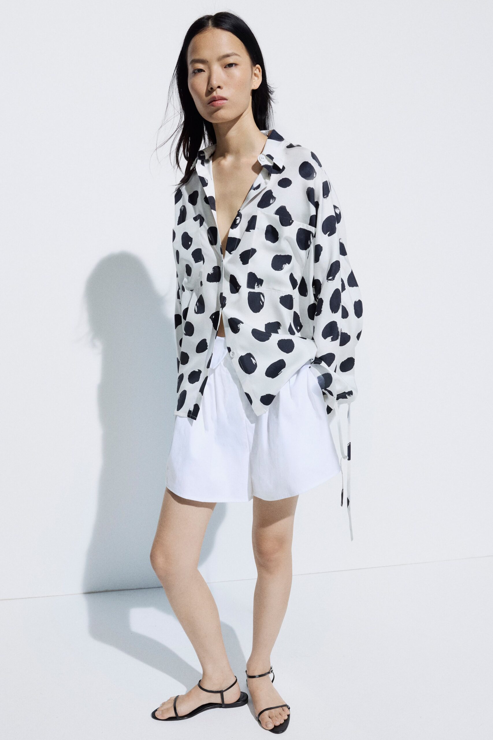 white long-sleeve collared relaxed printed buttoned shirt
