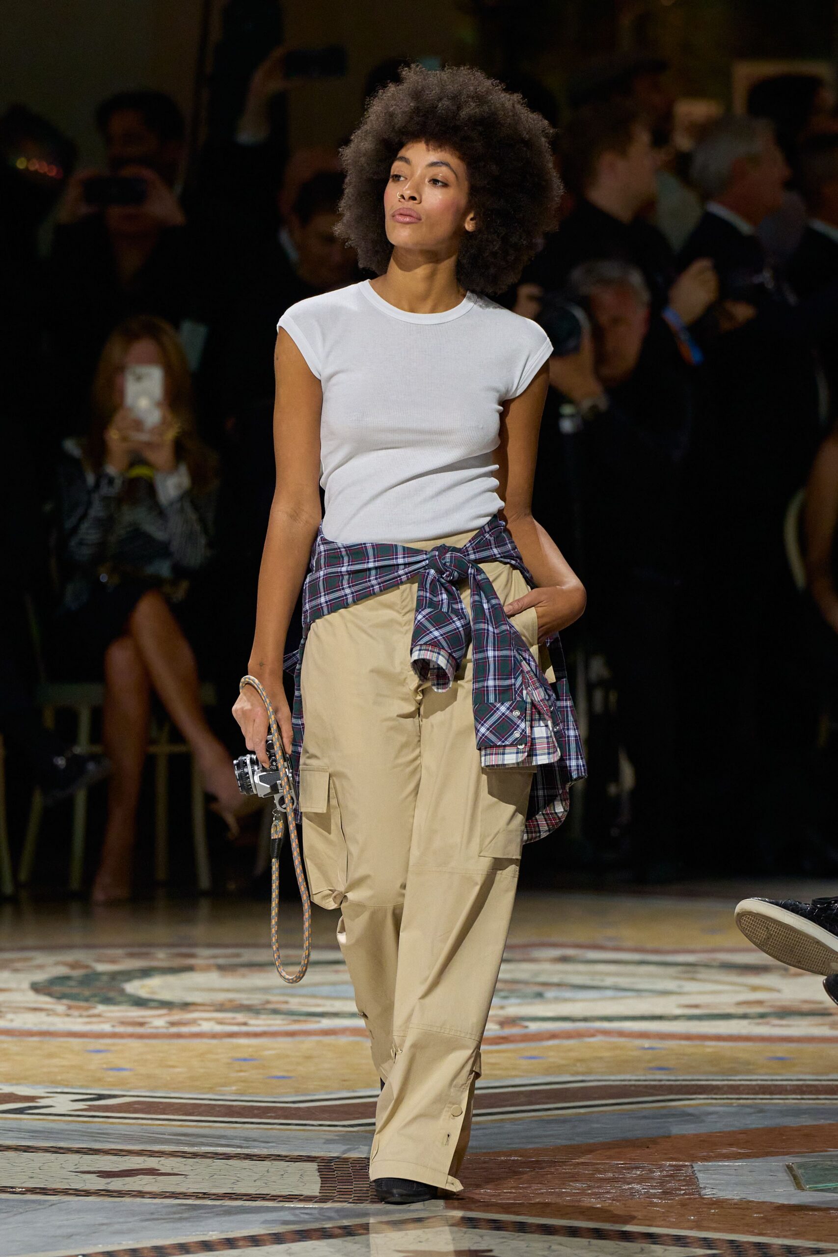 plaid shirt tied around waist