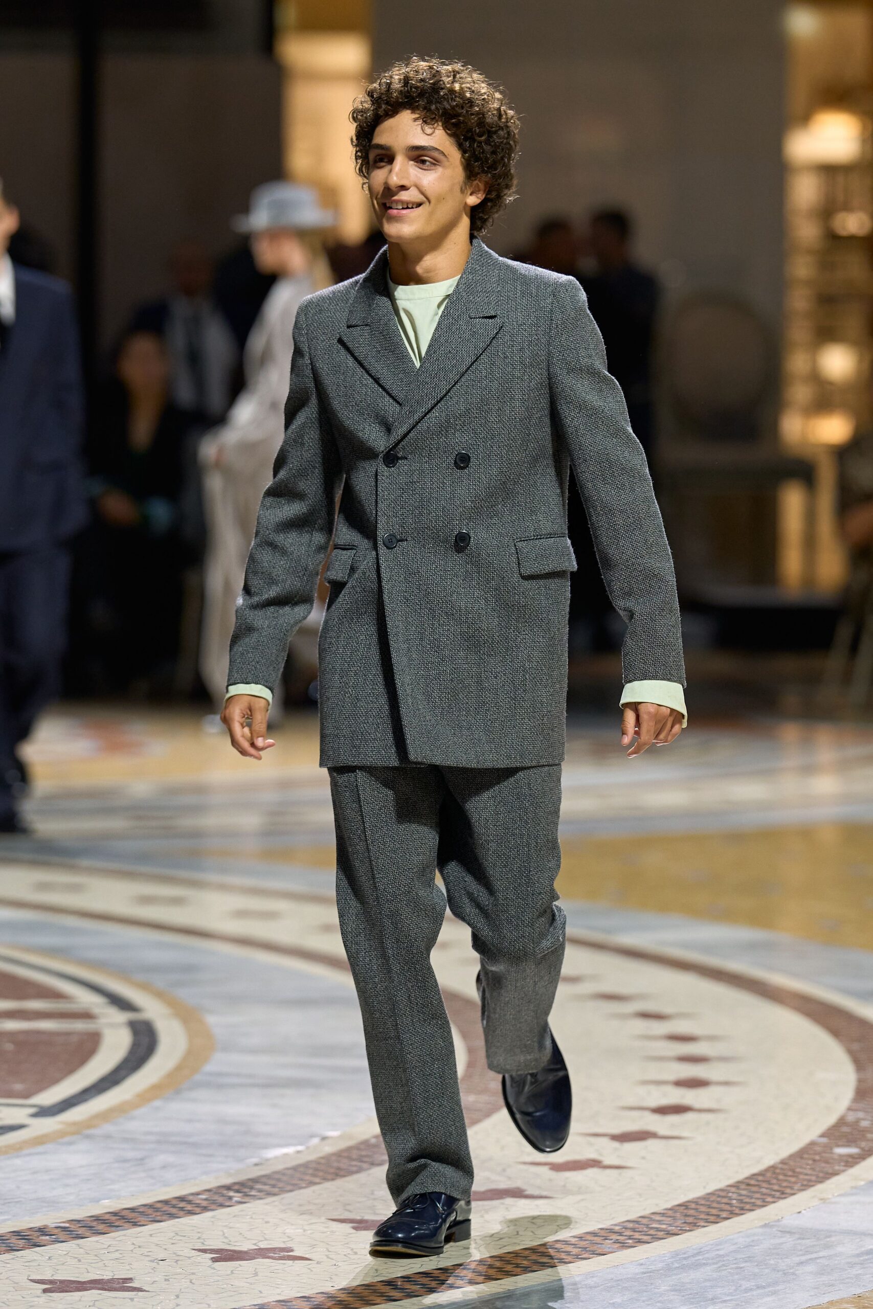 elongated double-breasted gray blazer