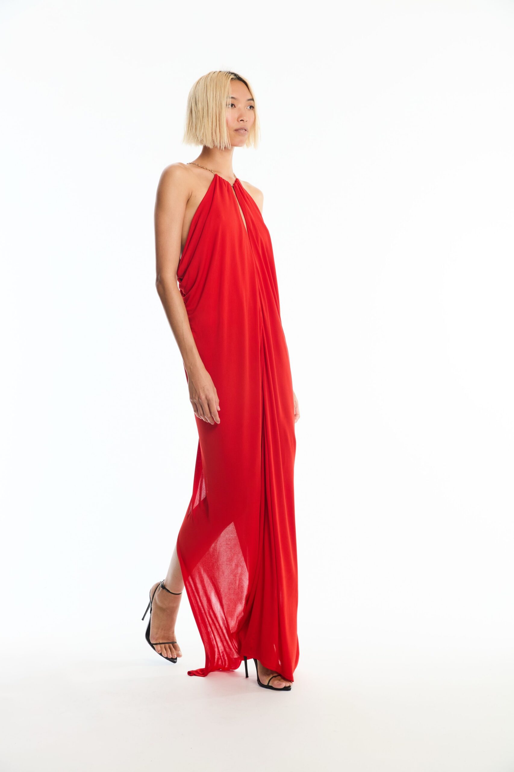 red draped halter evening gown