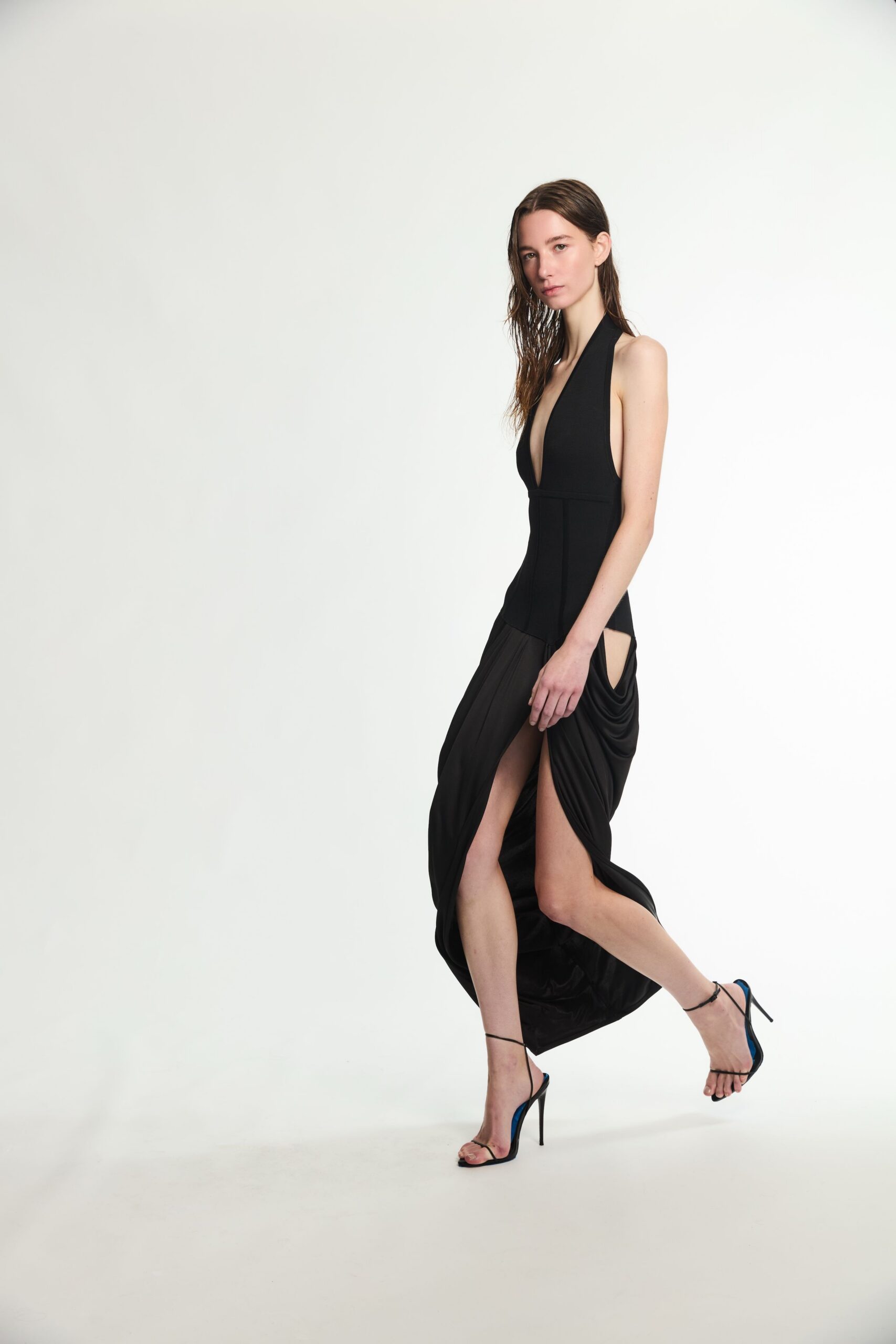 plunging halter draped black evening gown