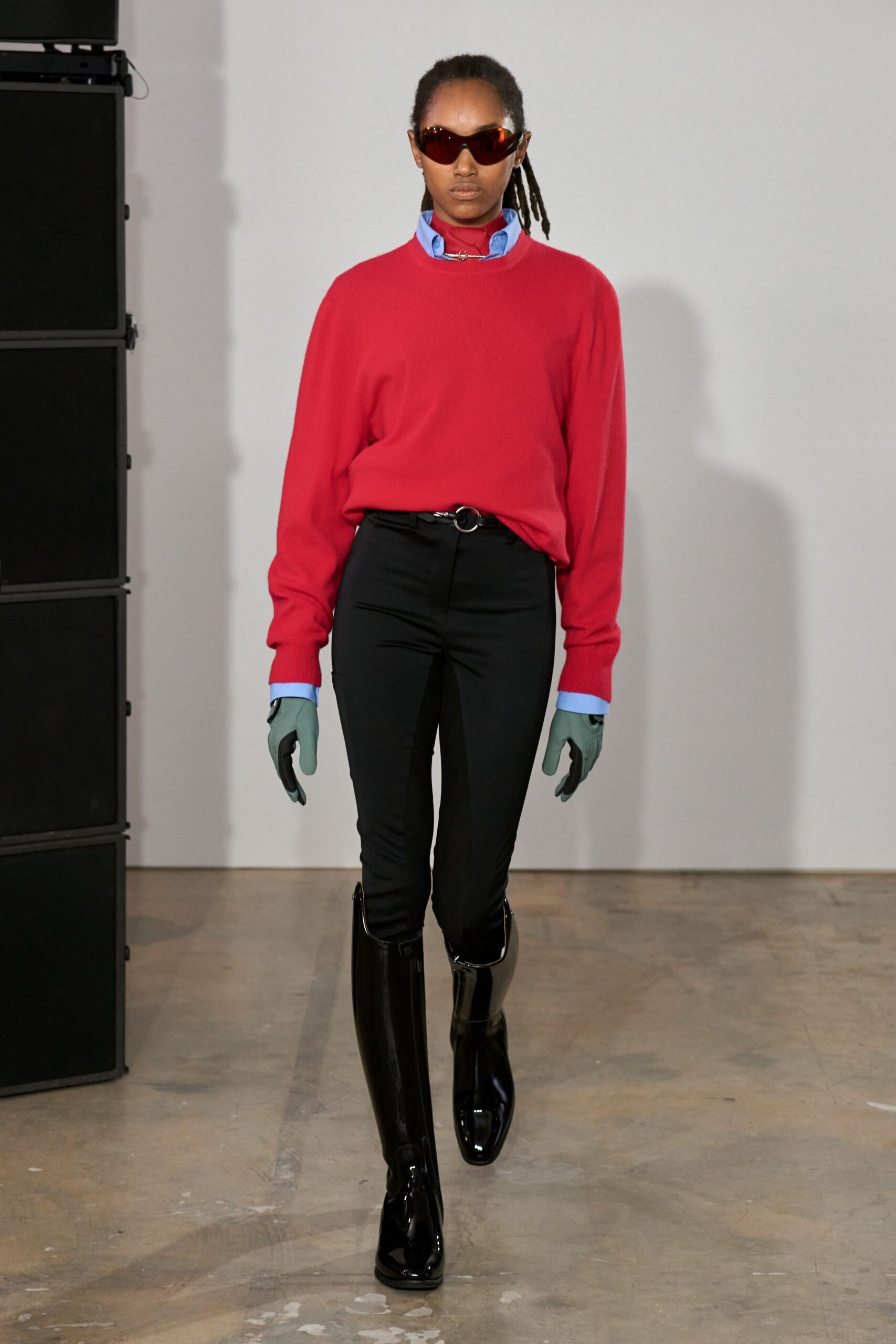red knit sweater layered over shirt