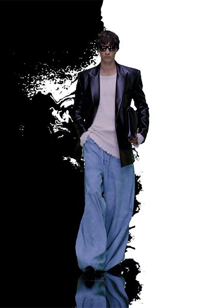 black leather blazer beige sweater blue pants