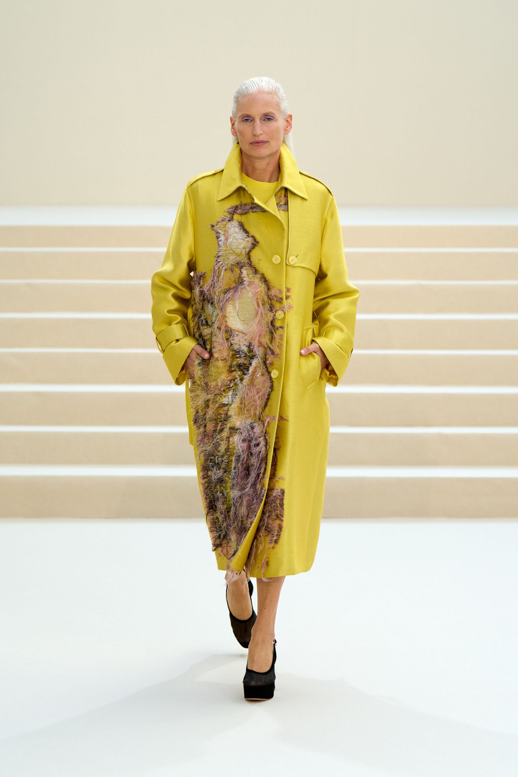 yellow feather-appliqué overcoat