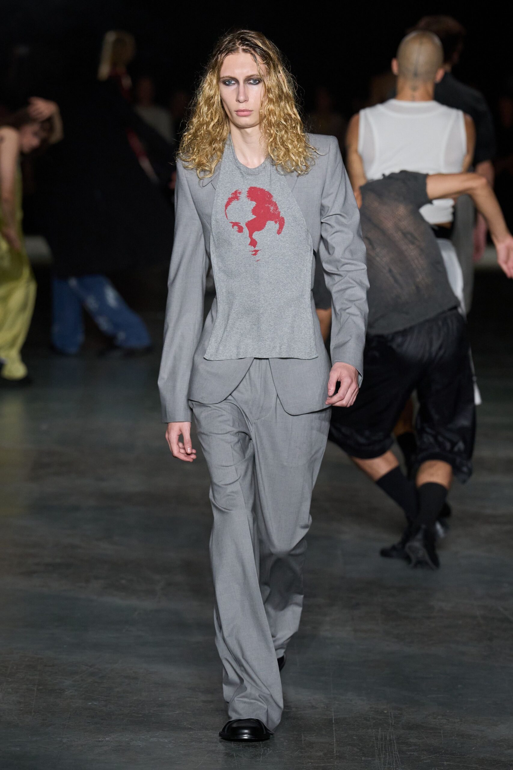 gray graphic T-shirt with tailored blazer