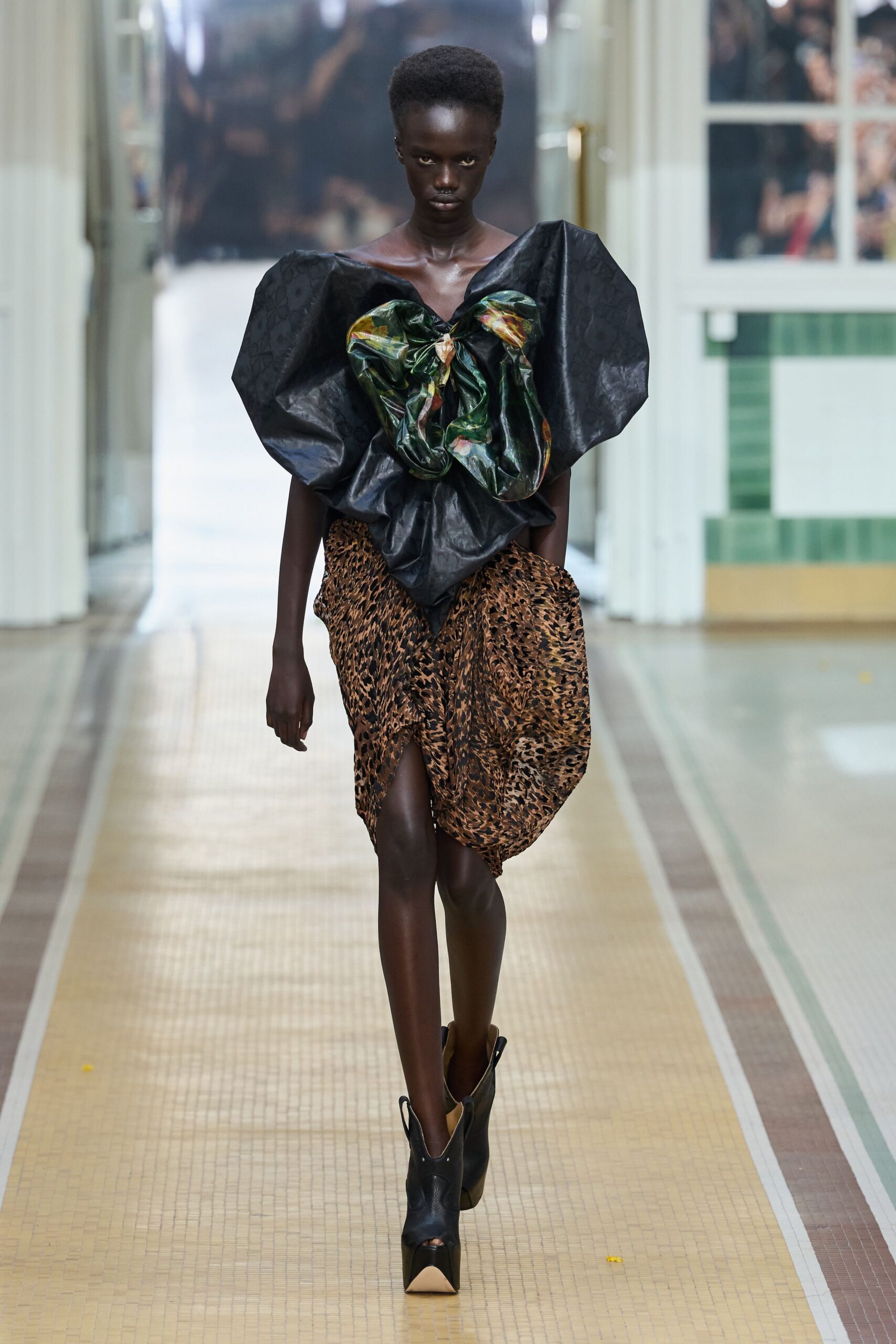 sculptural bow top with leopard skirt