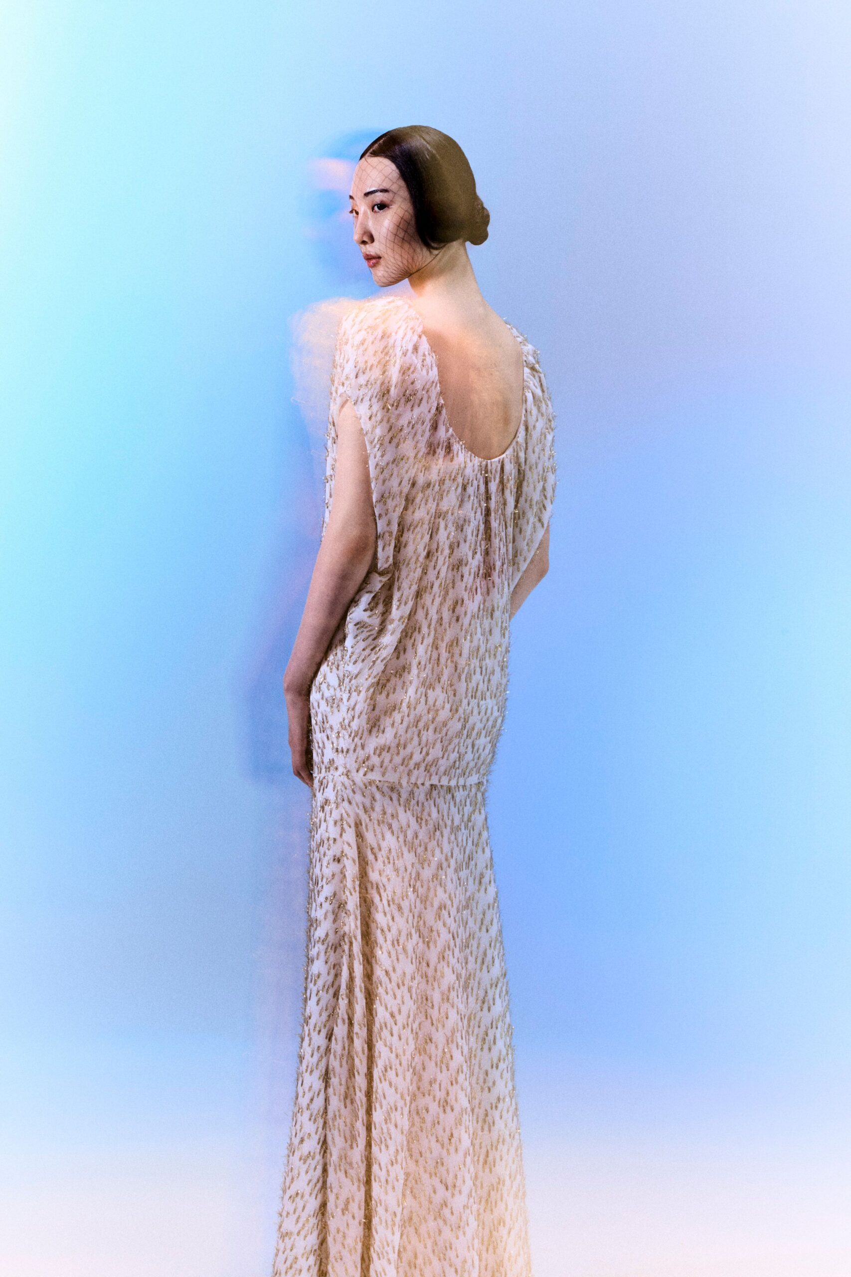 backless sequined evening gown