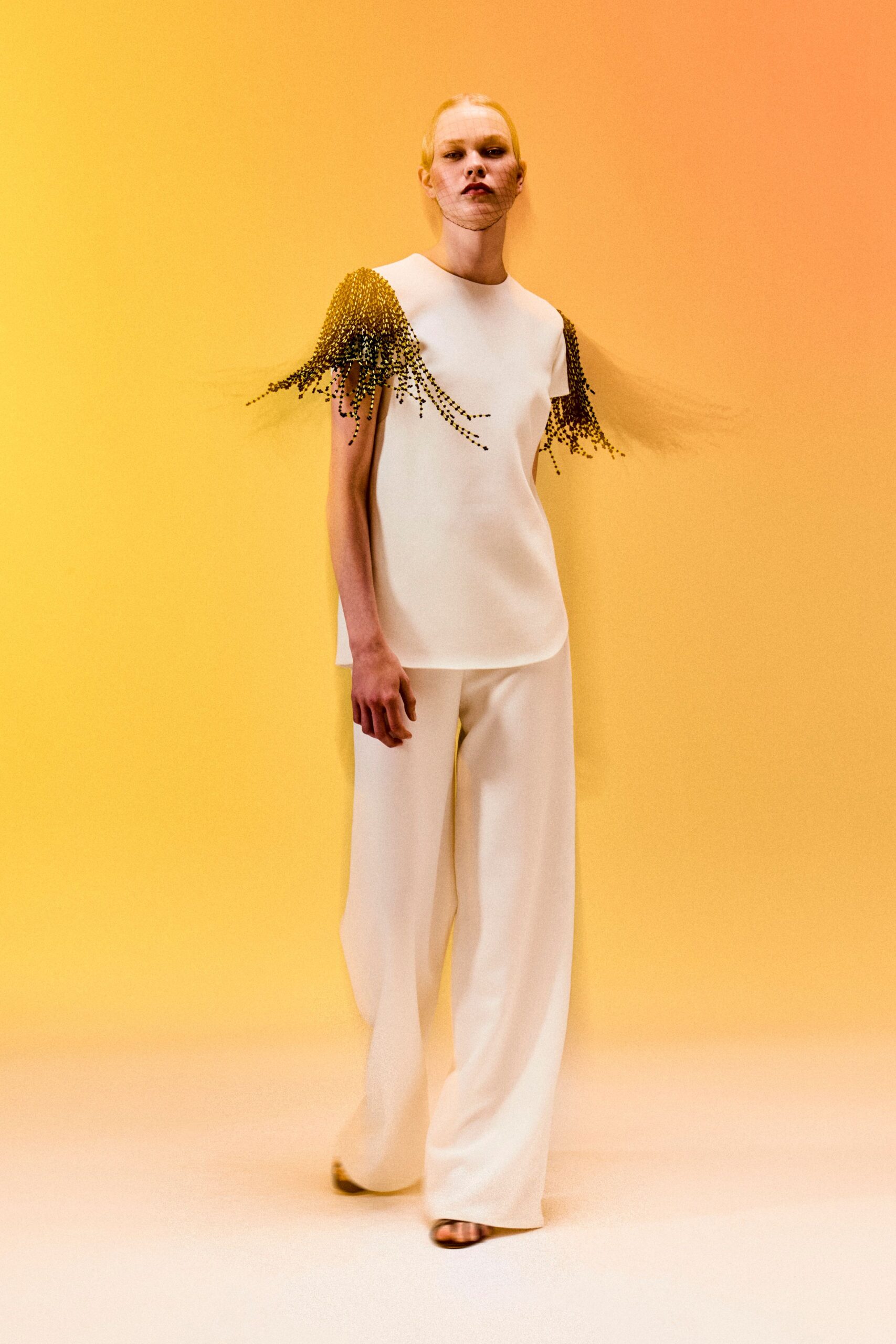 ivory top with beaded shoulder fringe