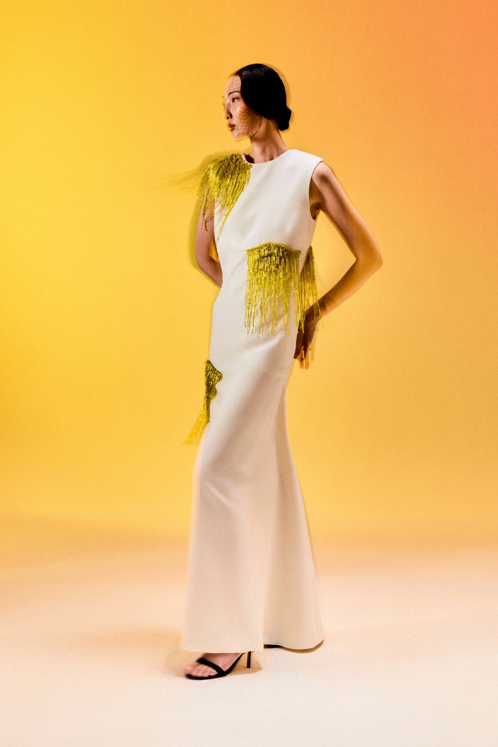 ivory fringed embellished evening gown